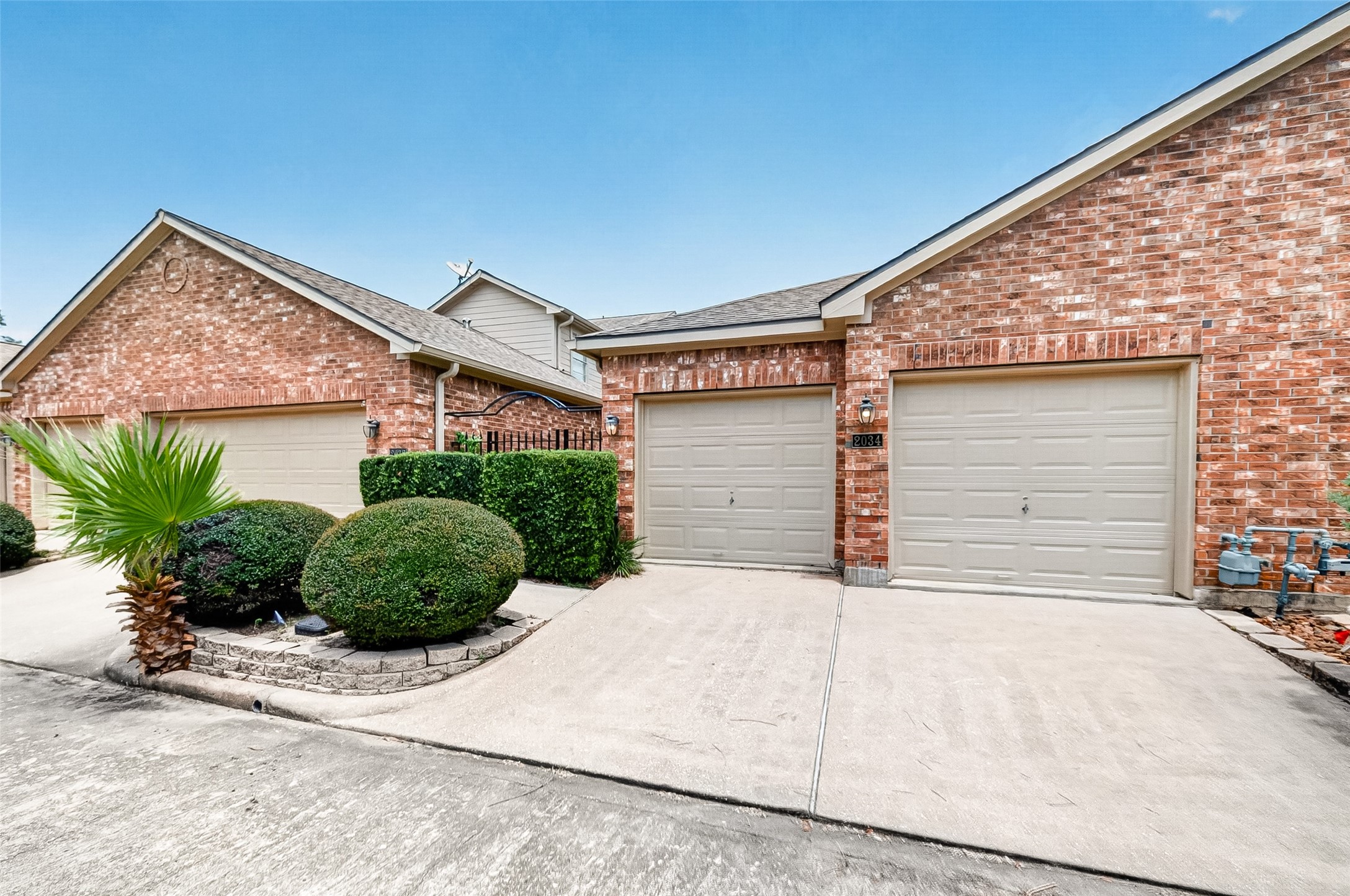 Well-maintained brick townhome with an attached garage
