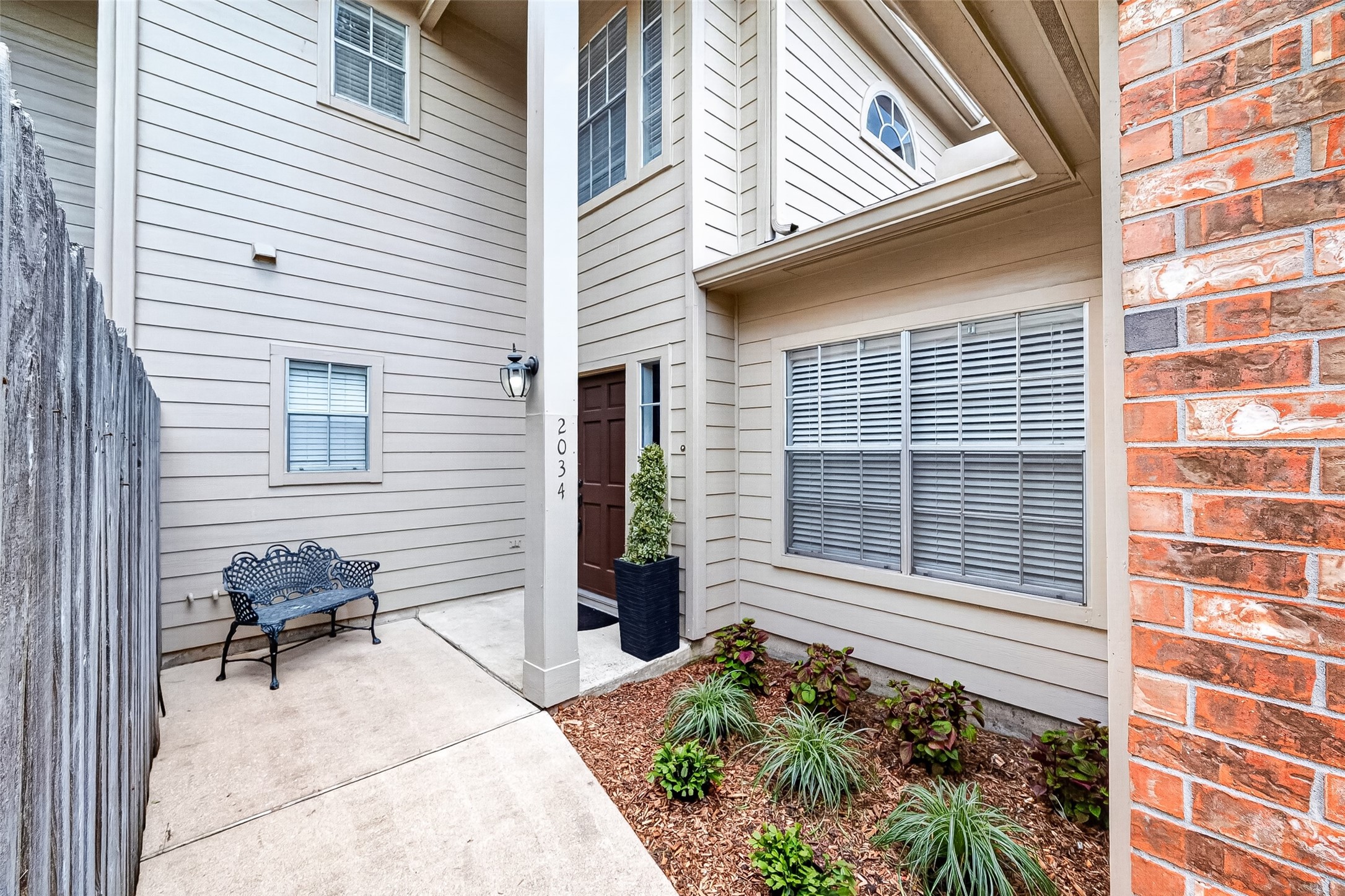 Private courtyard entry welcomes you home