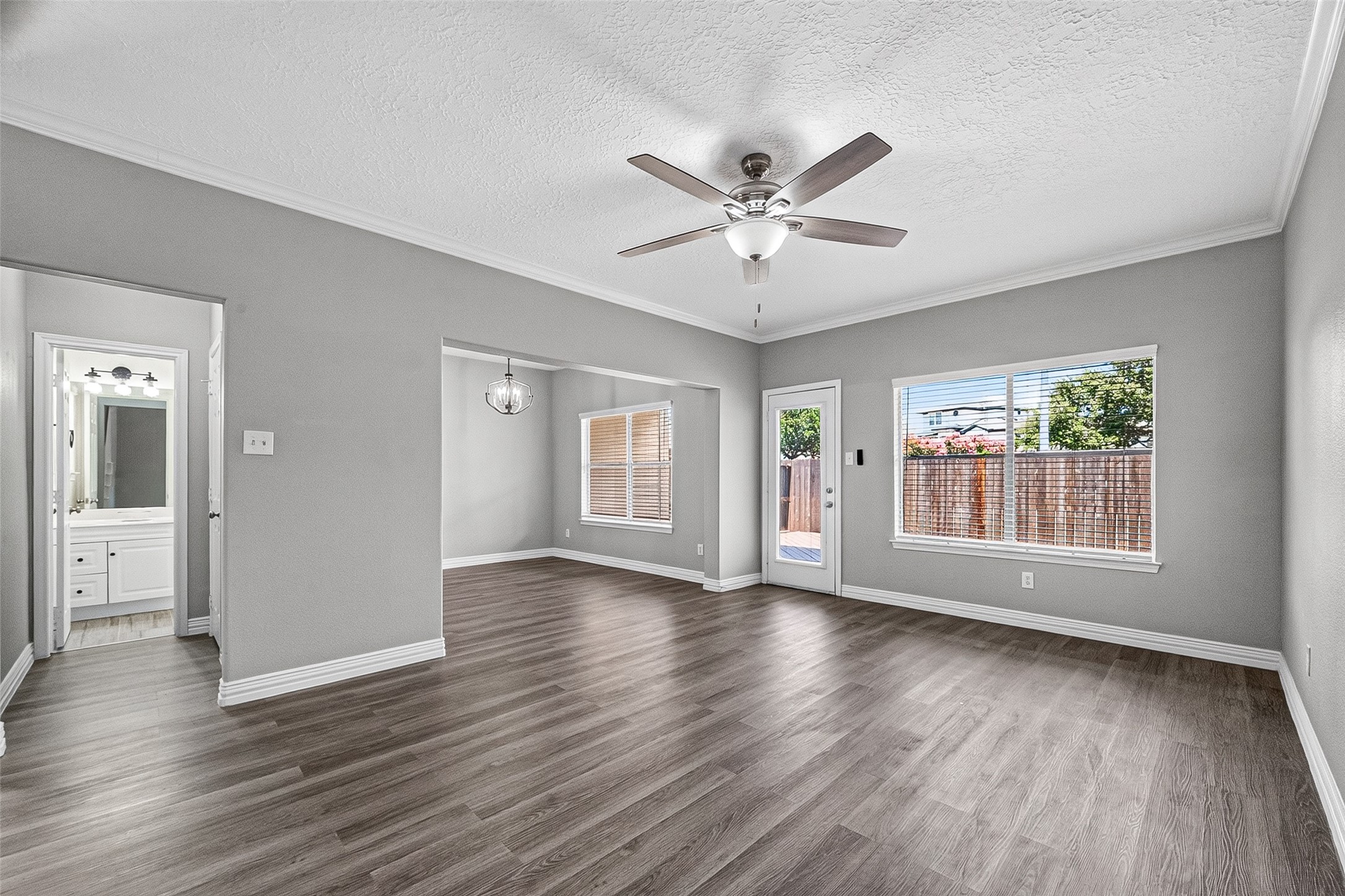 Open-concept layout connecting the living and dining areas