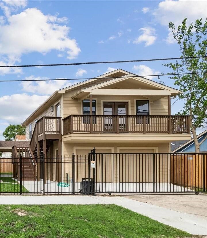 Welcome to this charming second-floor garage apartment, featuring its own separate entrance and a covered balcony.