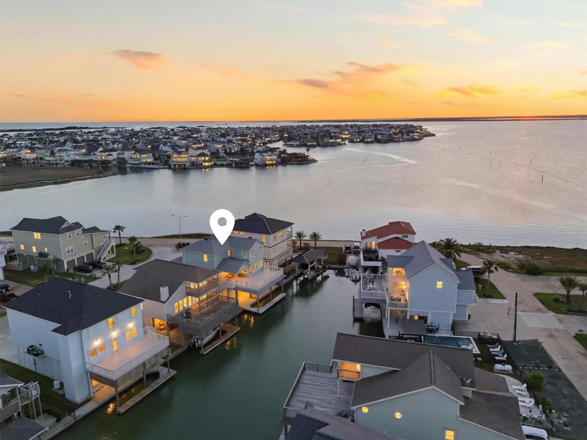 Sunset lovers and boaters, this
is the one. Nestled on coveted
Tiki Island, this impeccably
maintained 2021-built canal-front
home delivers direct Jones Bay
access, a private boat slip, and
the kind of waterfront lifestyle
that makes every day feel like a
getaway.