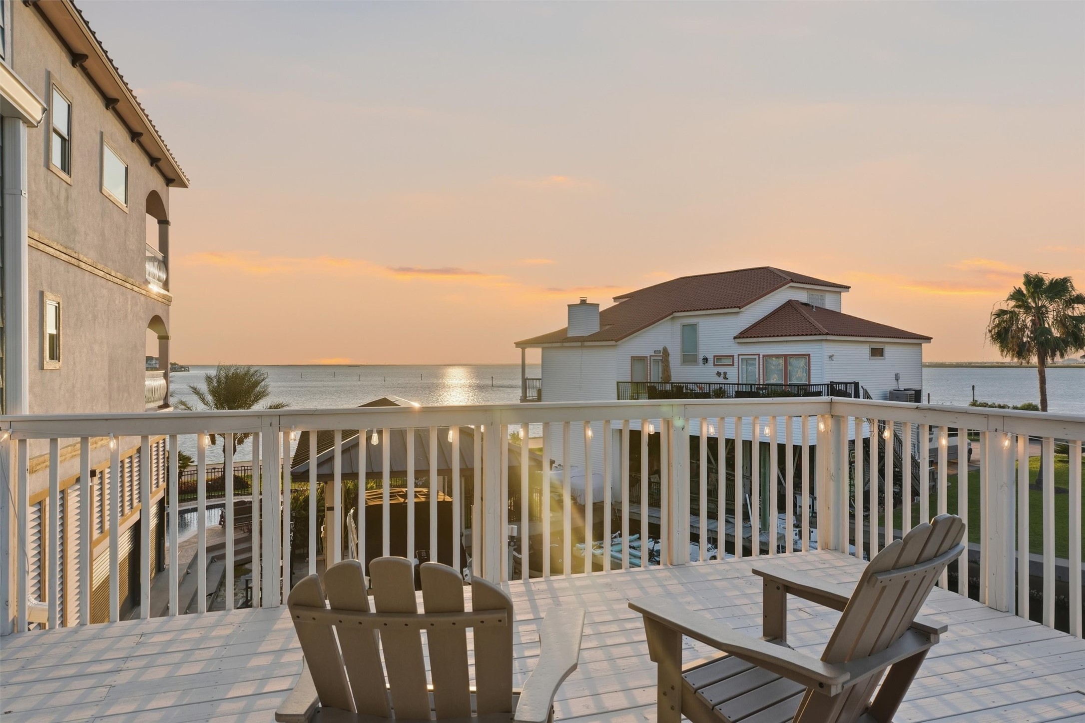 Pull up a chair and enjoy peaceful canal views from the spacious main-level balcony, where everyday moments feel more relaxed against a beautiful waterfront backdrop.