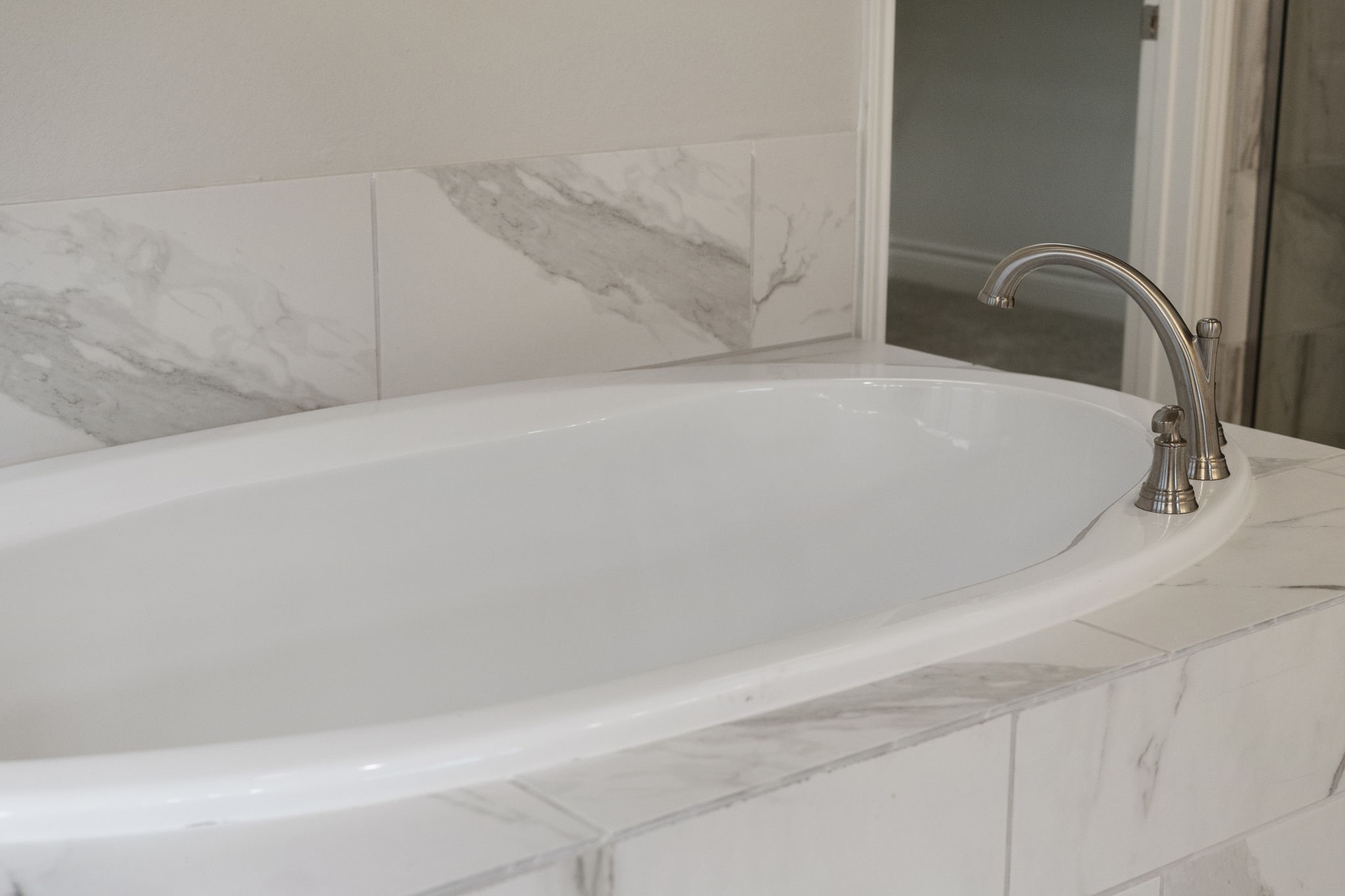 Unwind in the deep soaking tub for a relaxing end to the day.
