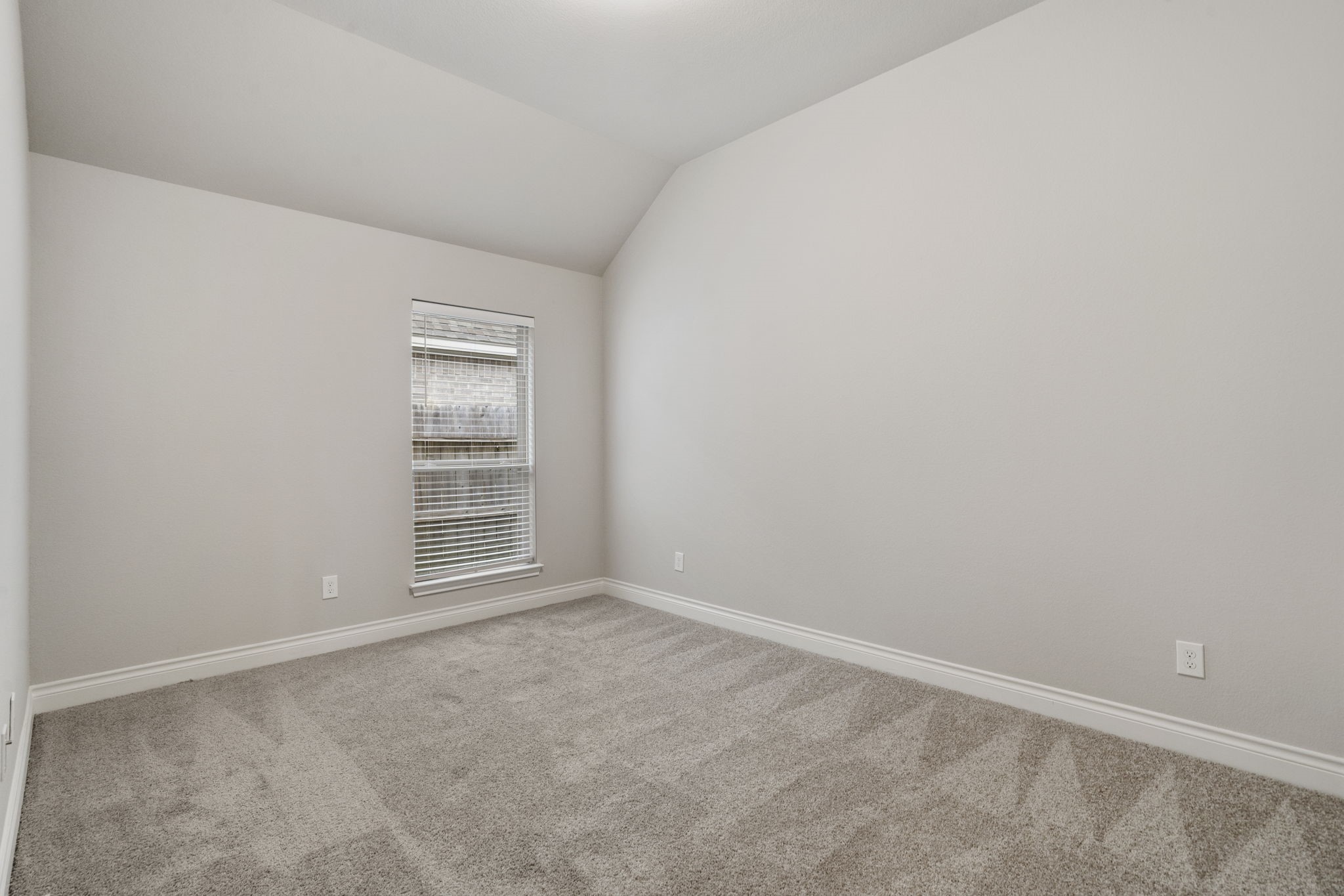Fresh new carpeting and a spacious walk-in closet complete this comfortable bedroom.