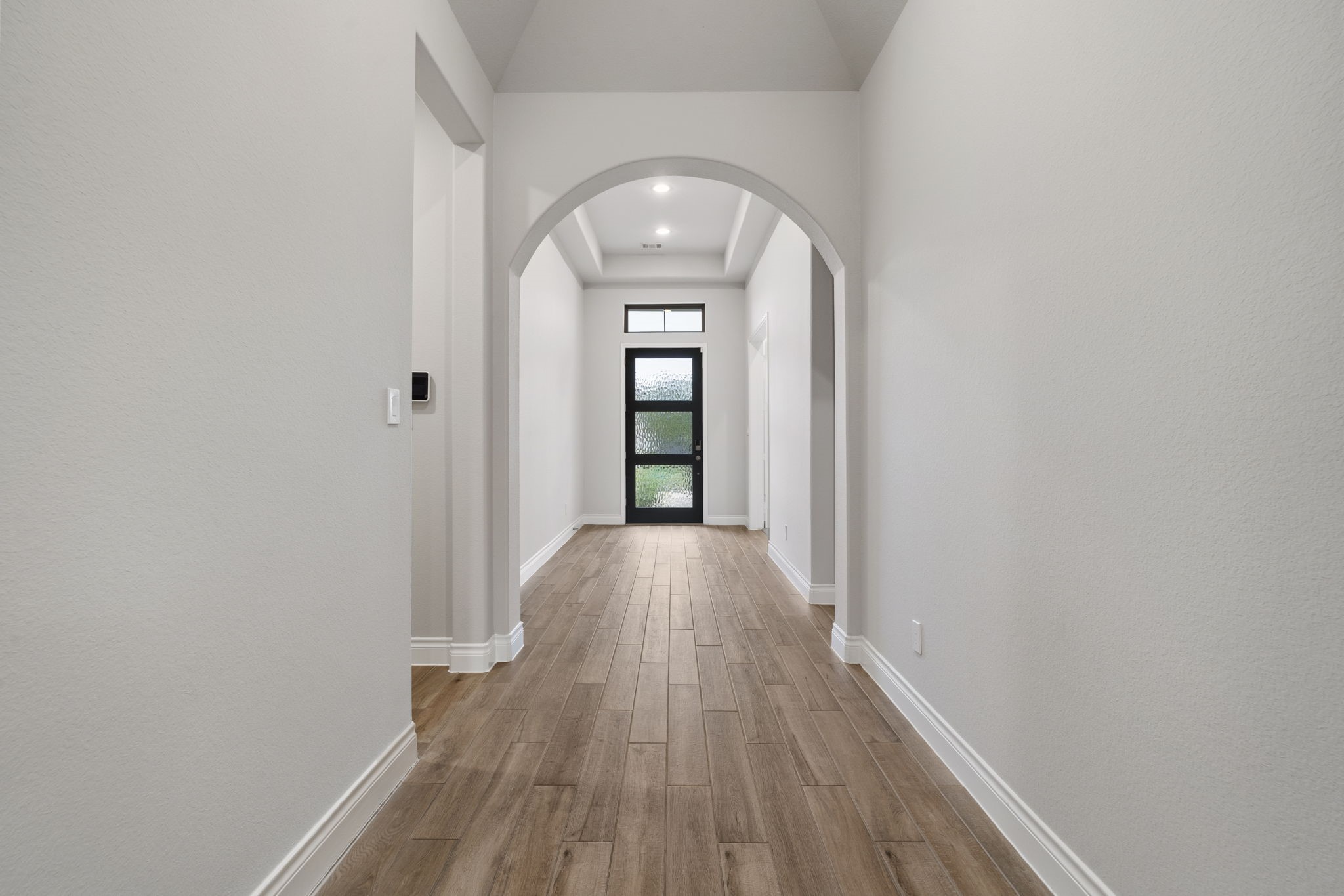 Elevated ceilings enhance the spacious feel, complemented by recessed LED daylight lighting that brightens the interiors with a crisp, modern glow.
