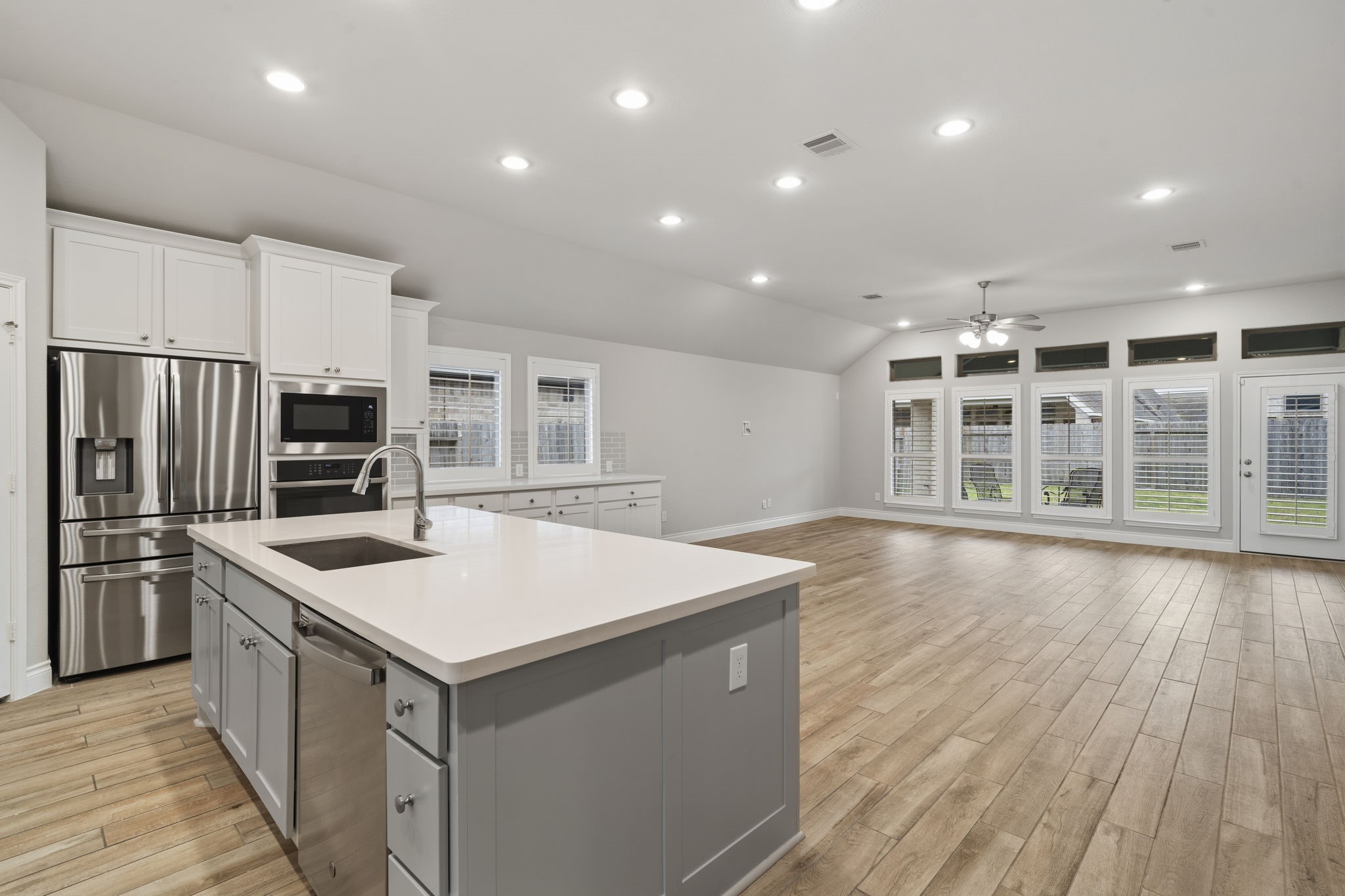 Ceiling-height cabinetry maximizes storage while creating a clean, finished look.