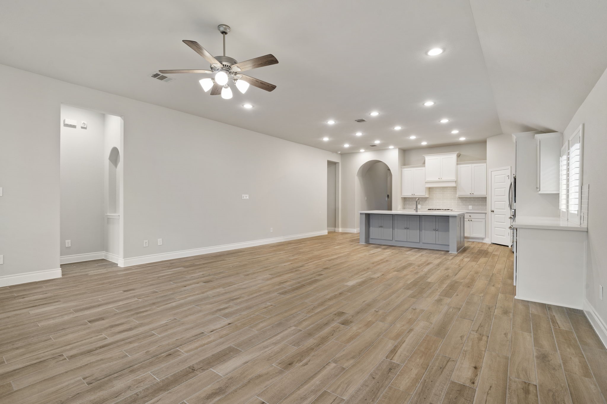 This view of the family room highlights the entrance to the private owners suite.