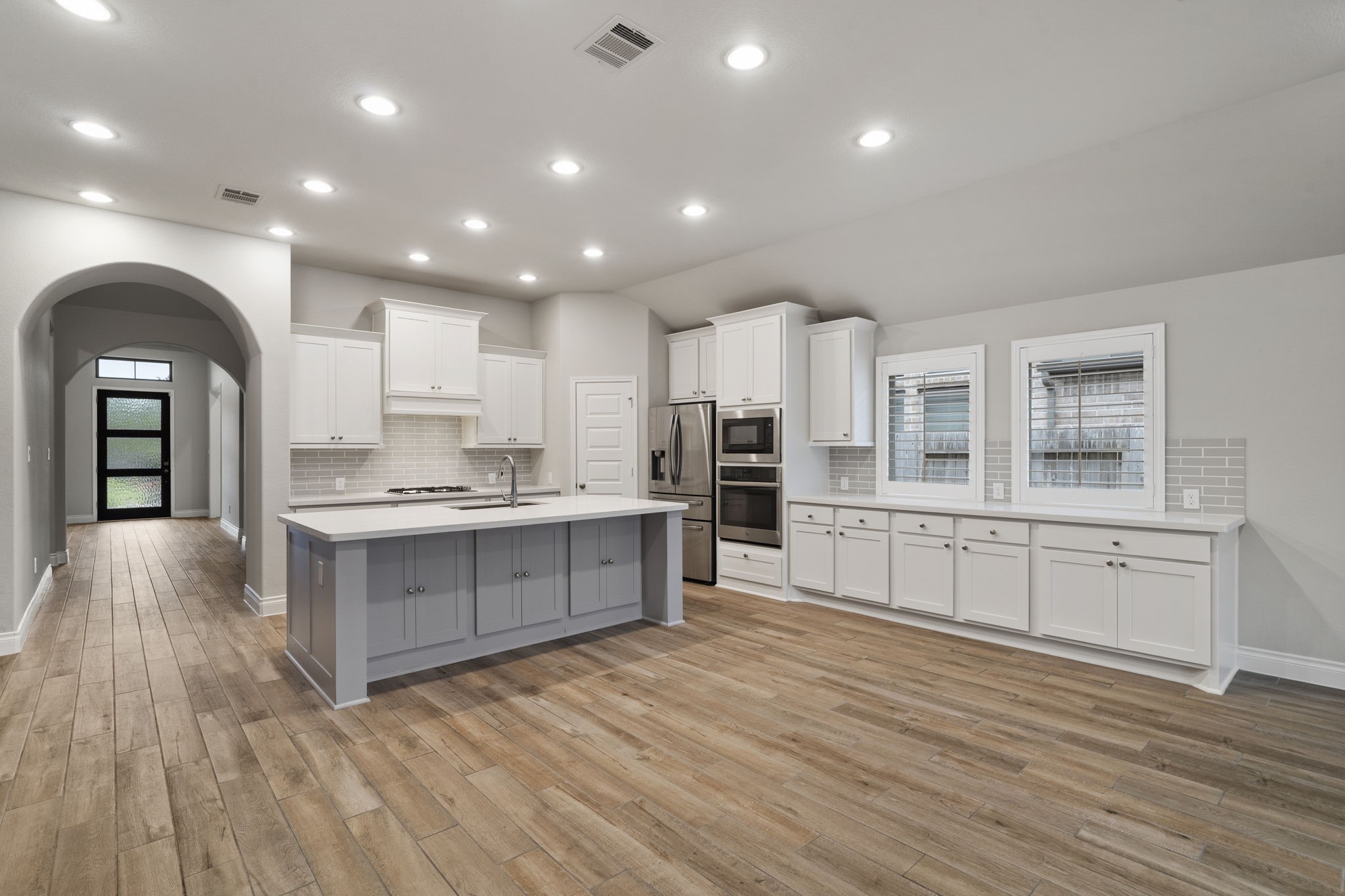 The extended foyer opens to the kitchen, dining area, and family room, creating a natural flow for everyday living and entertaining. The extended foyer opens to the kitchen, dining area, and family room, creating a natural flow for everyday living and entertaining.