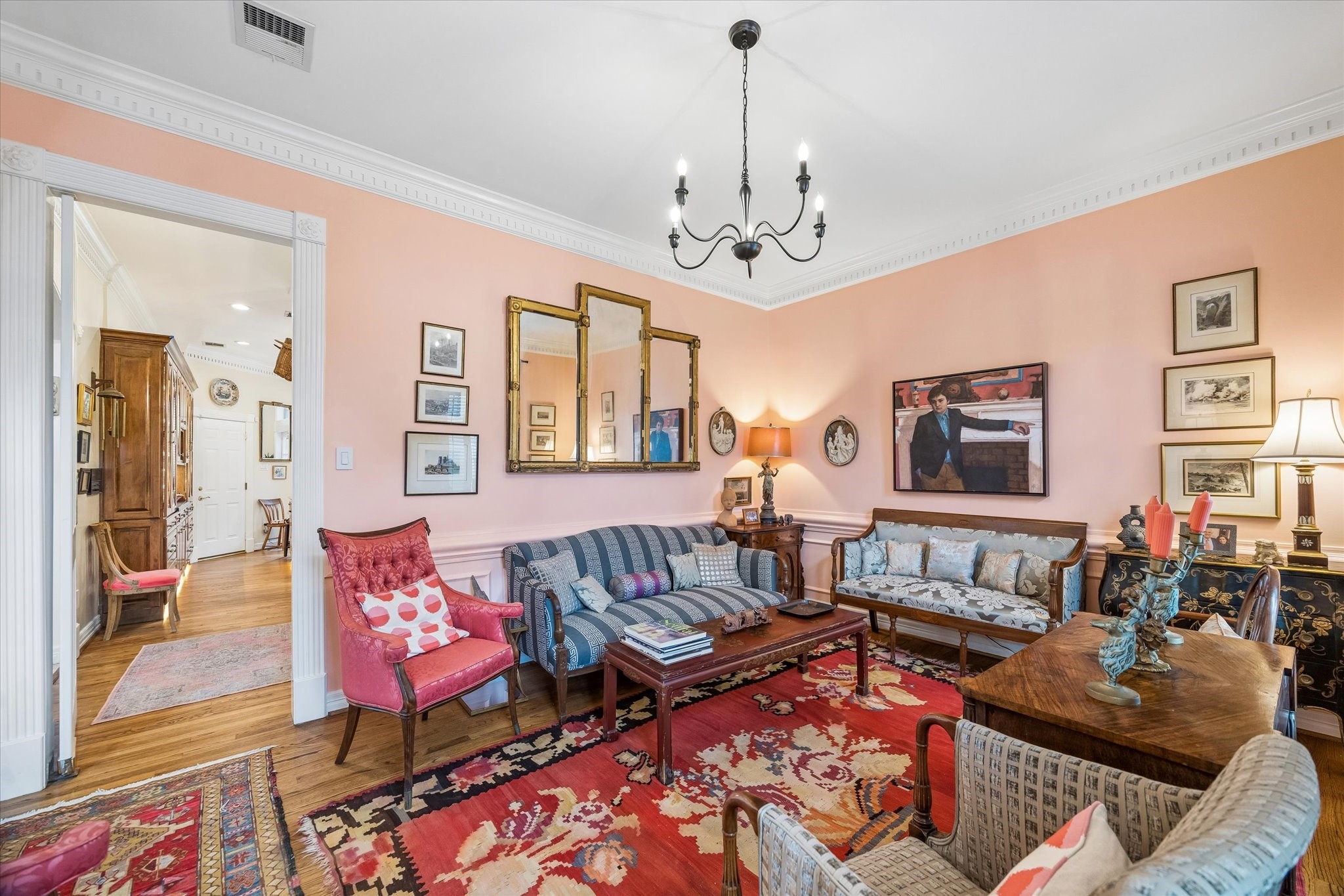 The formal living room flows seamlessly into the kitchen. Each space has elements that keep the first floor cohesive while maintaining each room's individual charm.