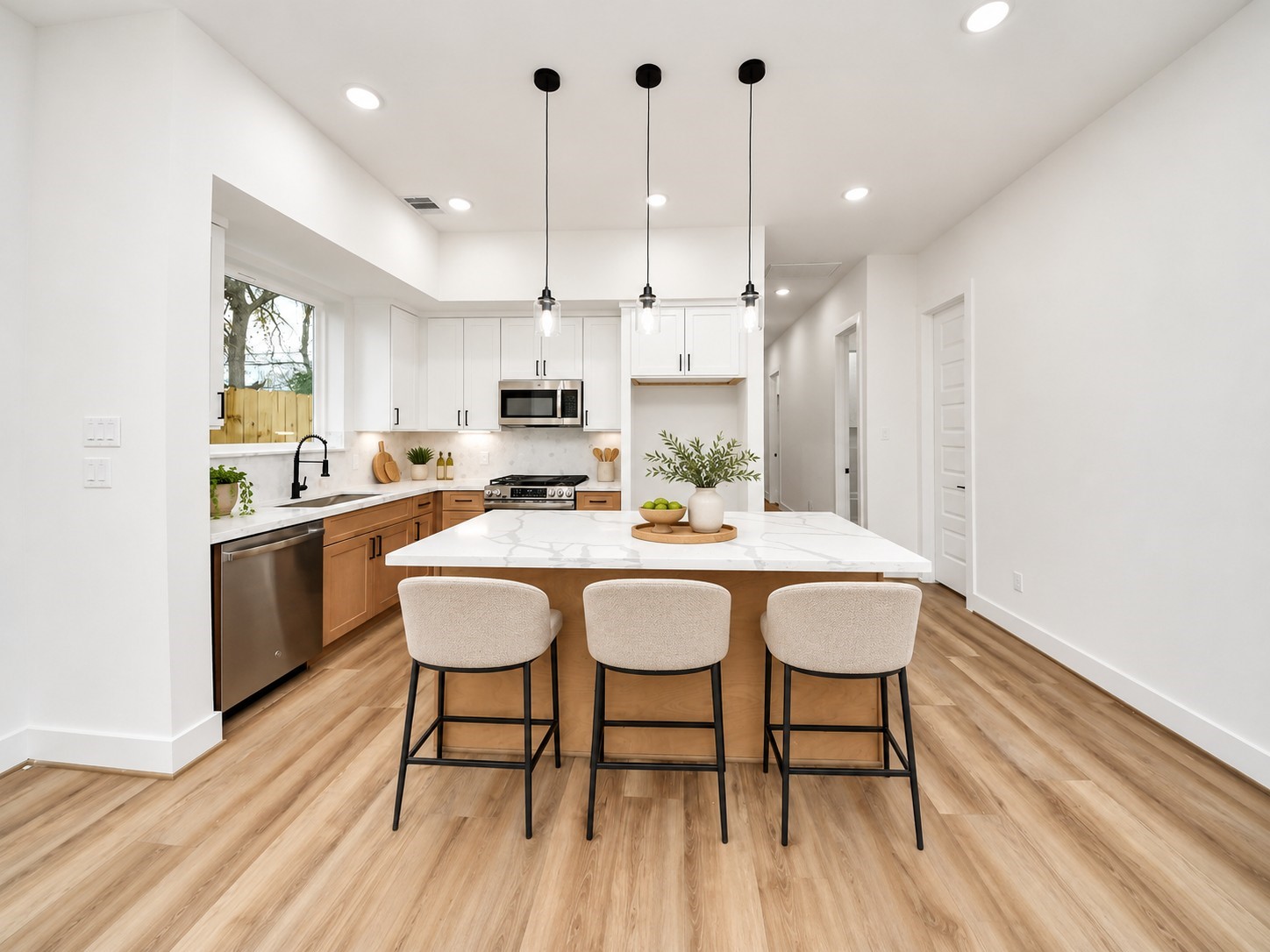 Virtually staged first-floor kitchen.