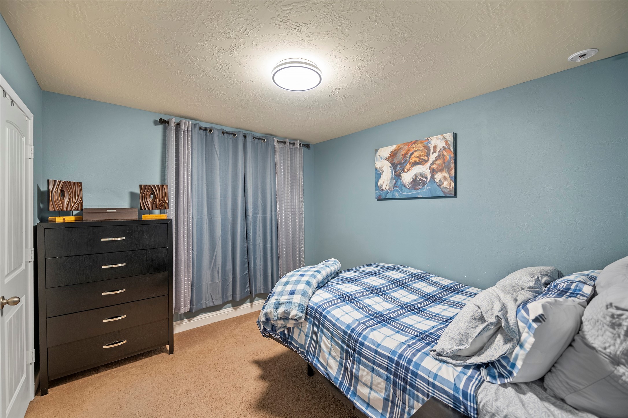 Secondary bedroom located on the second floor.
