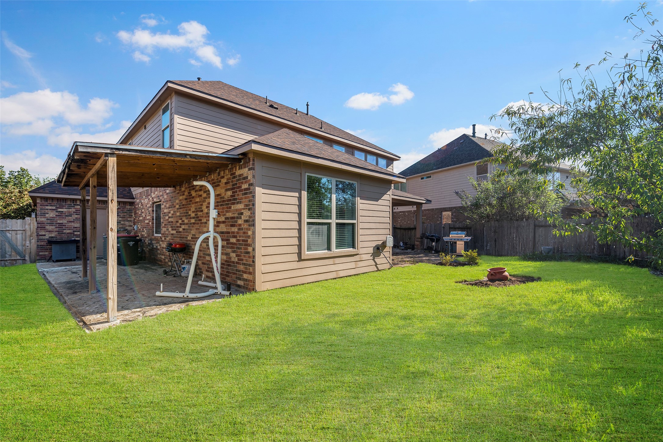 Note: The grass in this photo has been virtually enhanced to demonstrate the property's full potential.