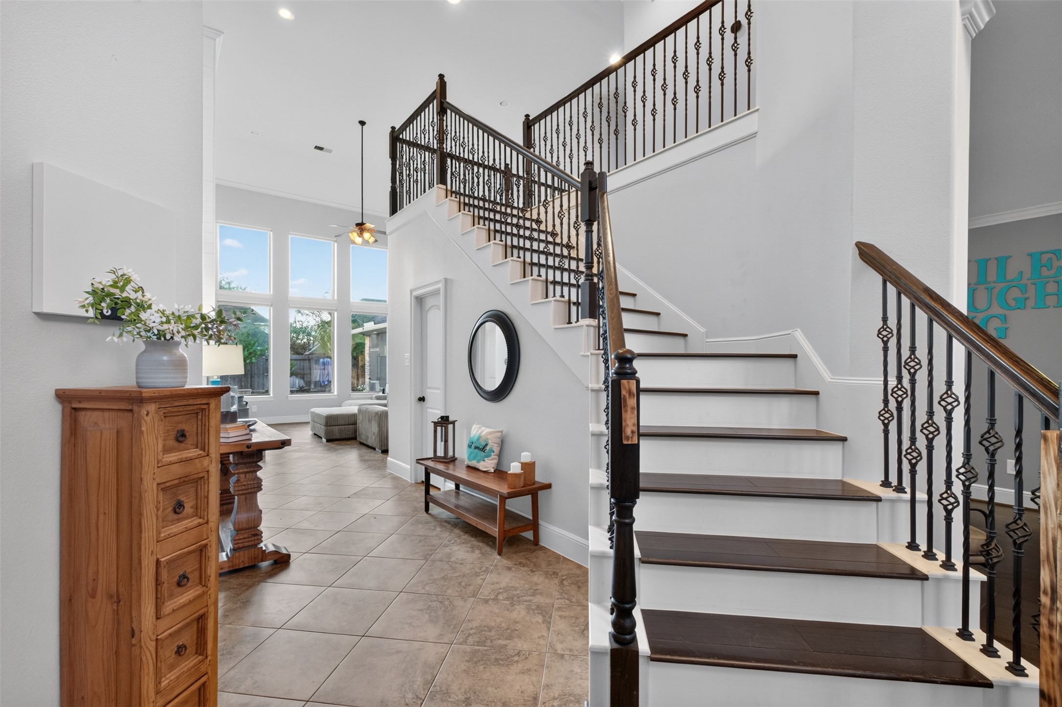 The homes double height ceilings and bay of windows provides fabulous natural light