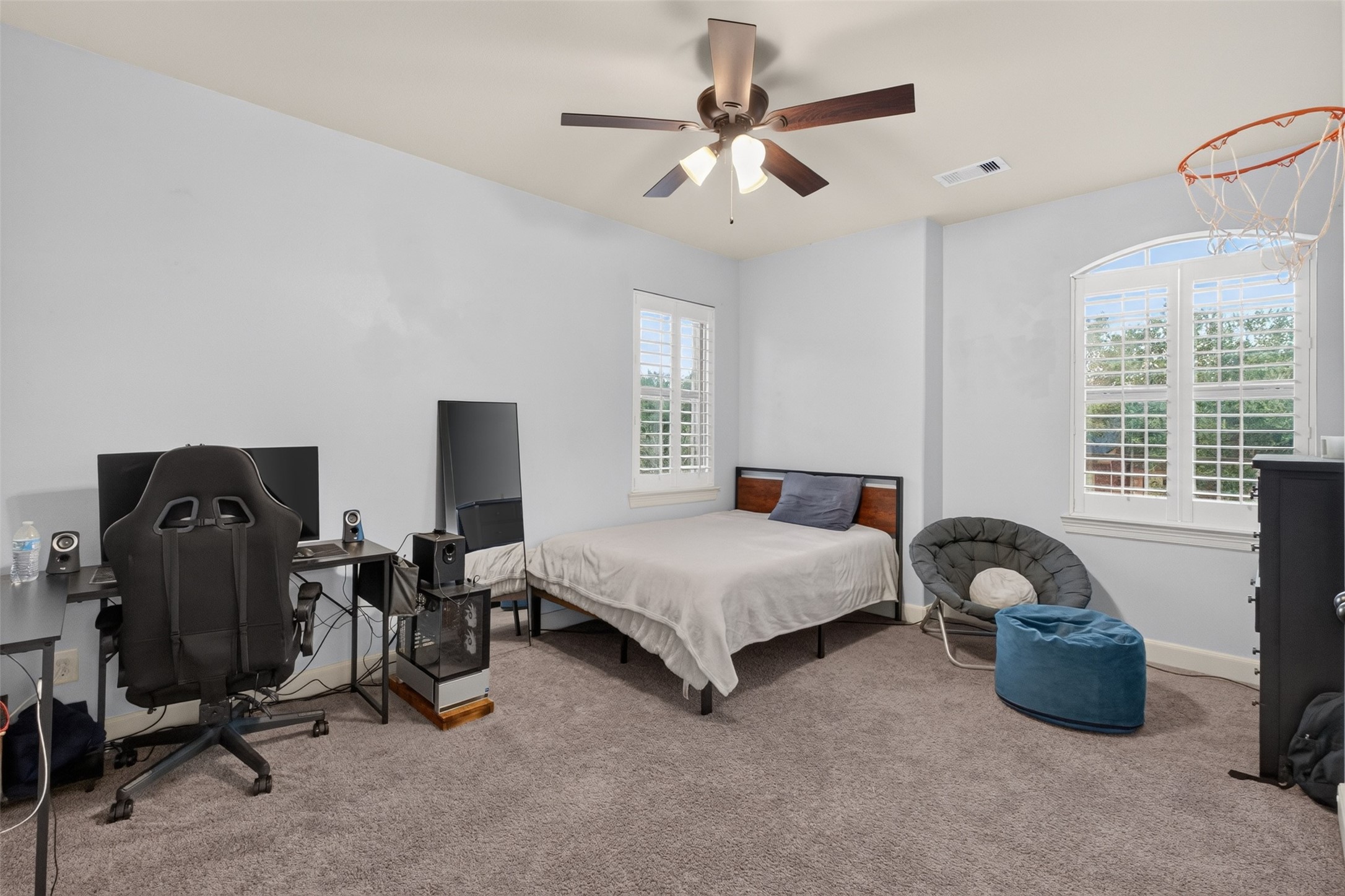 Second bedroom upstairs, with plantation shutters and plenty of space
