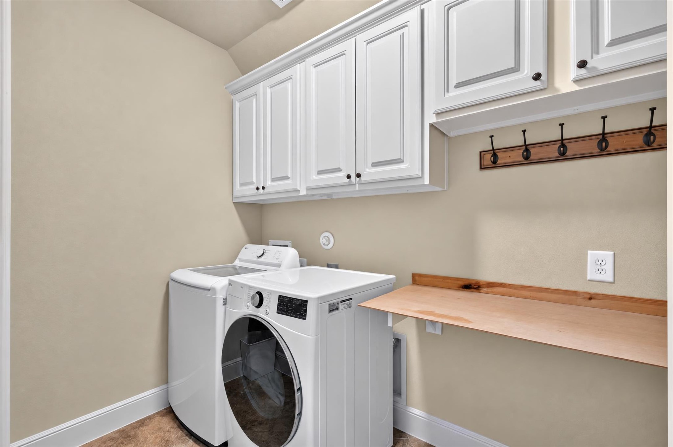 Large Laundry room with plenty of storage and folding space