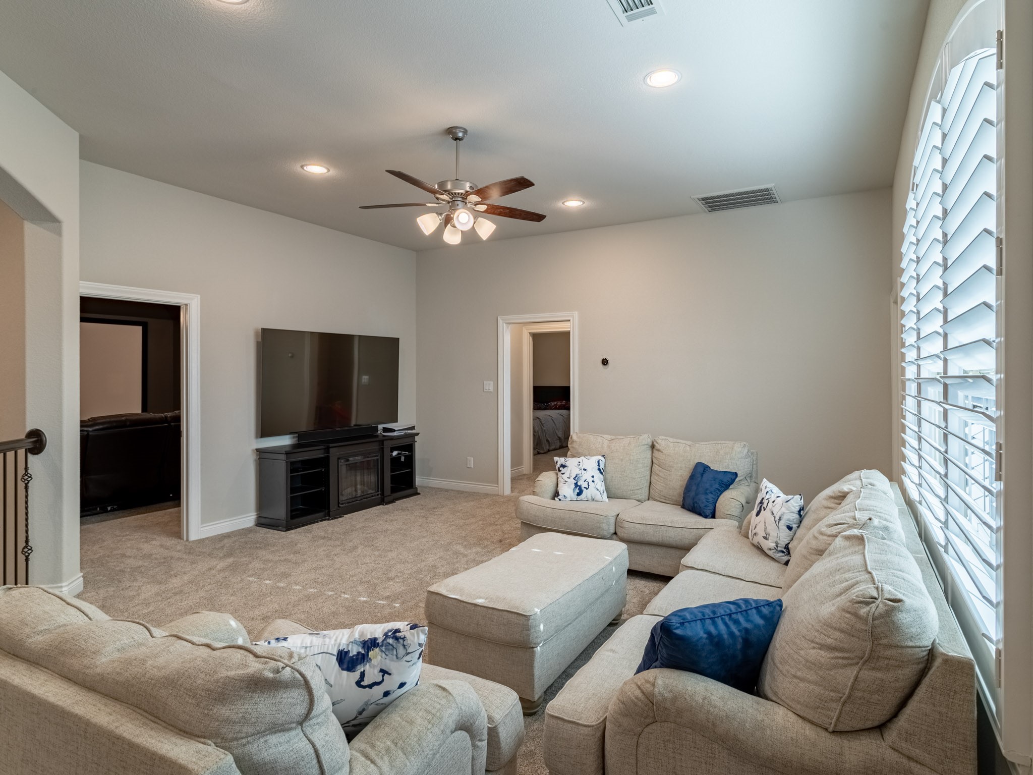Game room looking into Media room and towards hall to 2 secondary bedrooms
