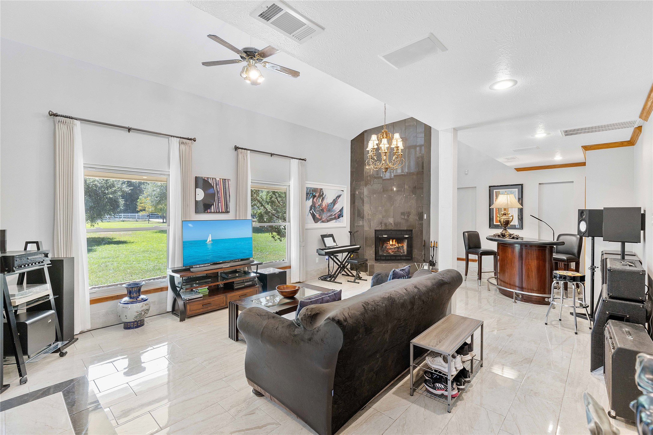 Front living area with wood burning fireplace
