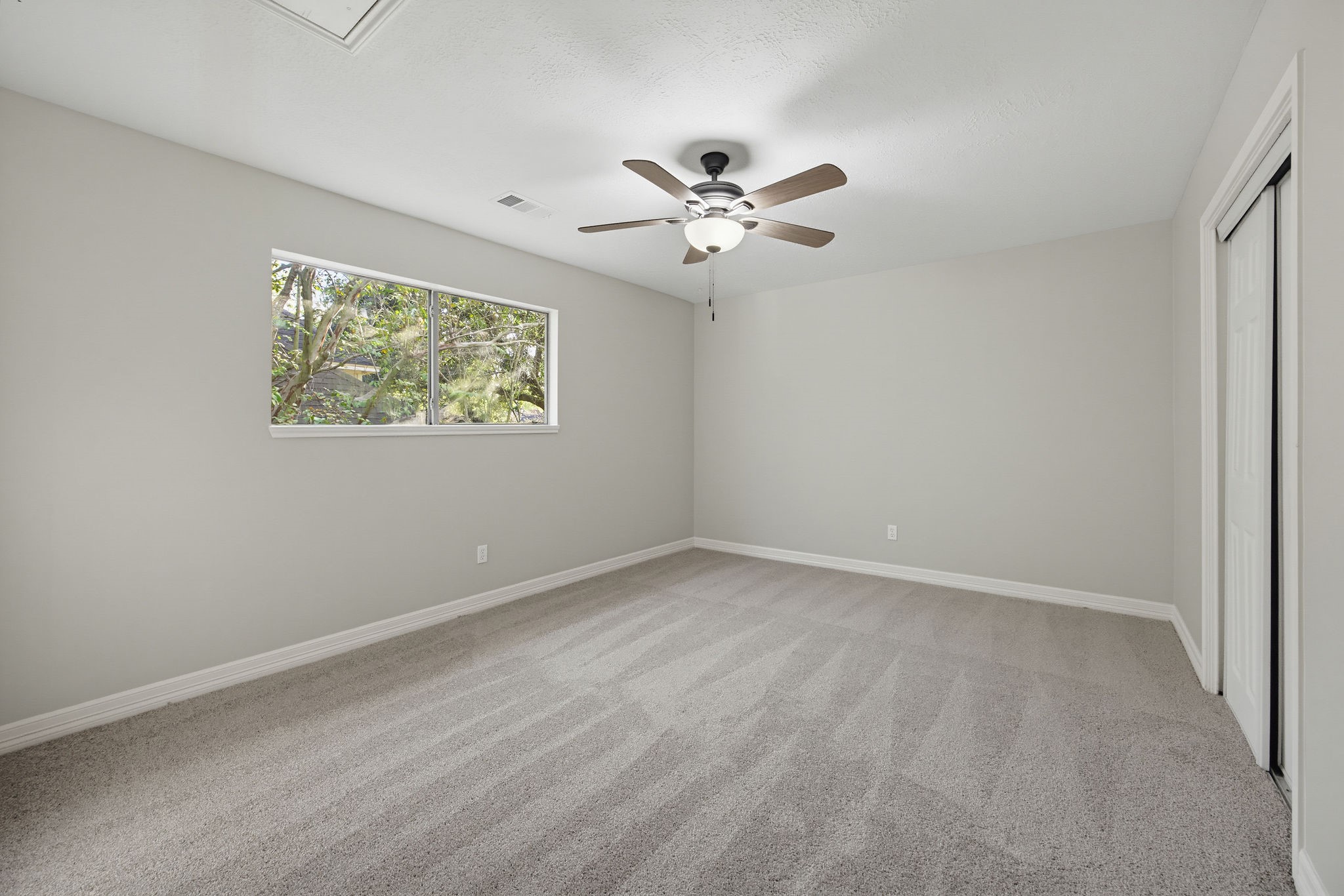 8015 Ash Valley Drive, Spring, TX 77379