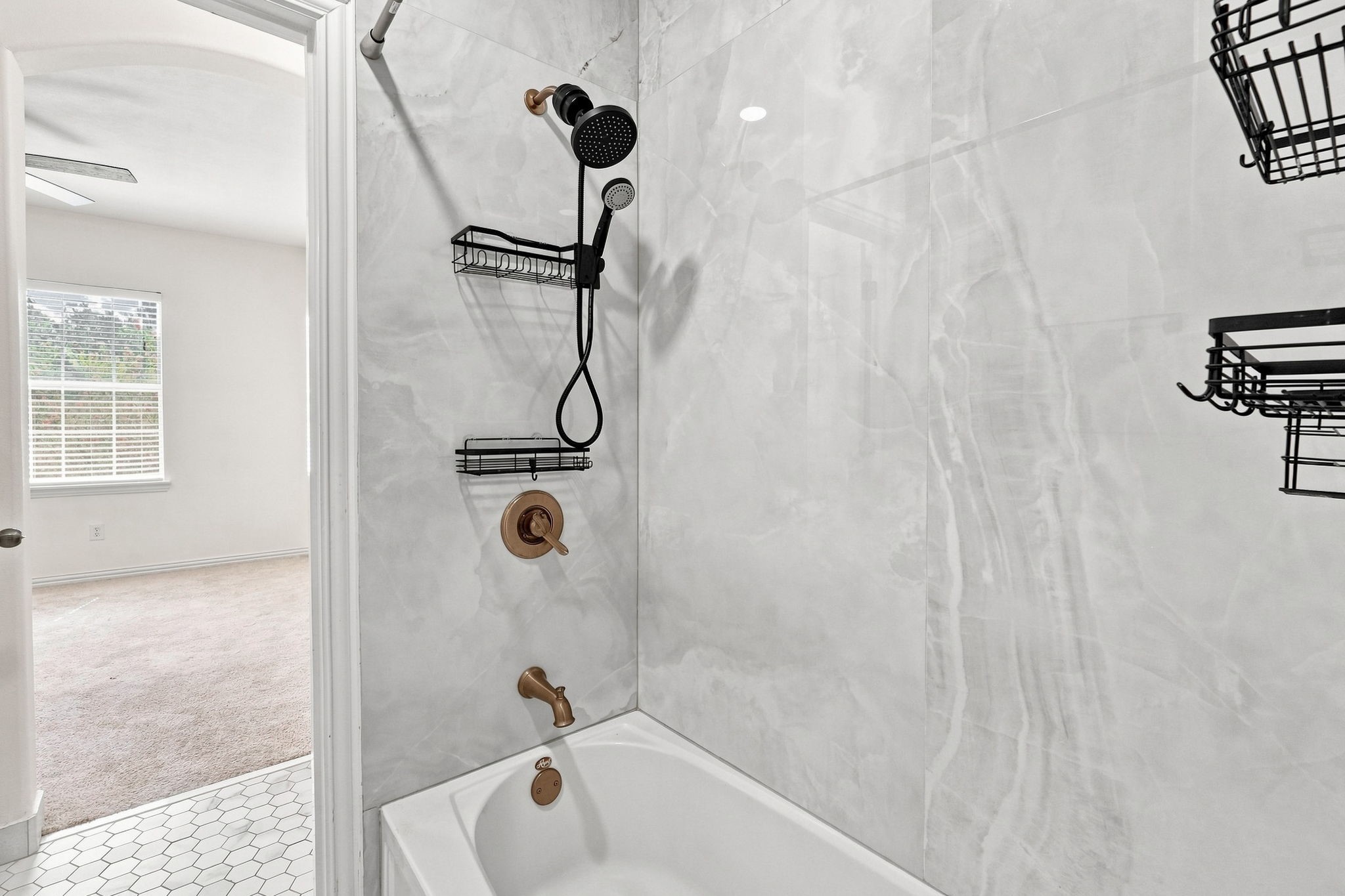 Updated Jack and Jill bathroom connecting secondary bedroom #2 and #3