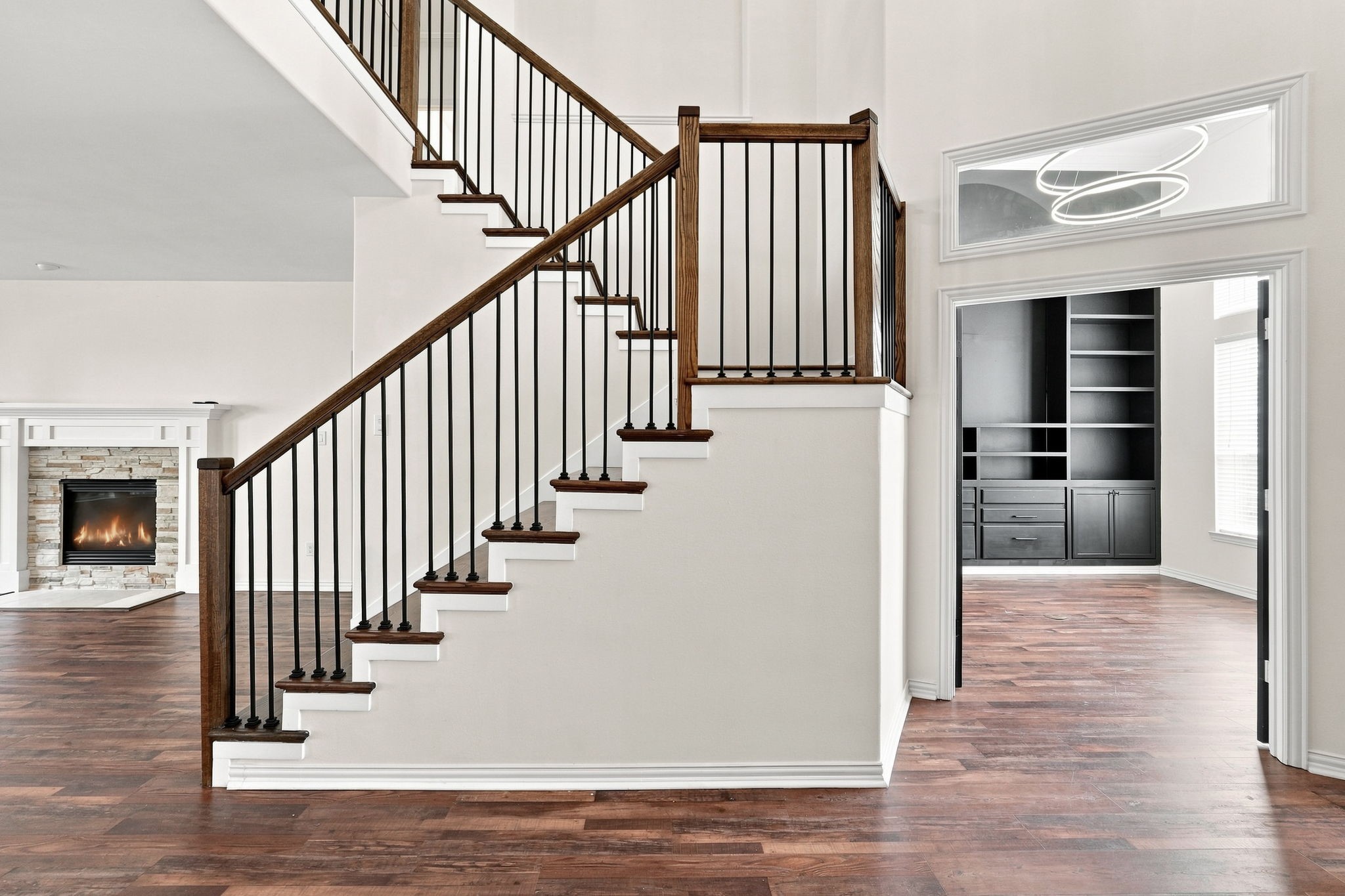 Main entry foyer with views into home office and family room