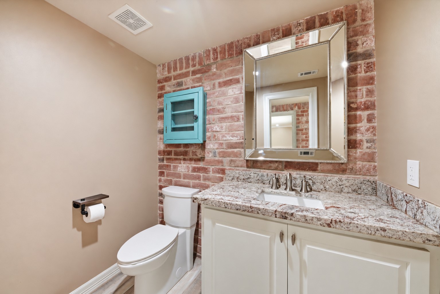 Powder bath with access to the flex room and outdoor pool area