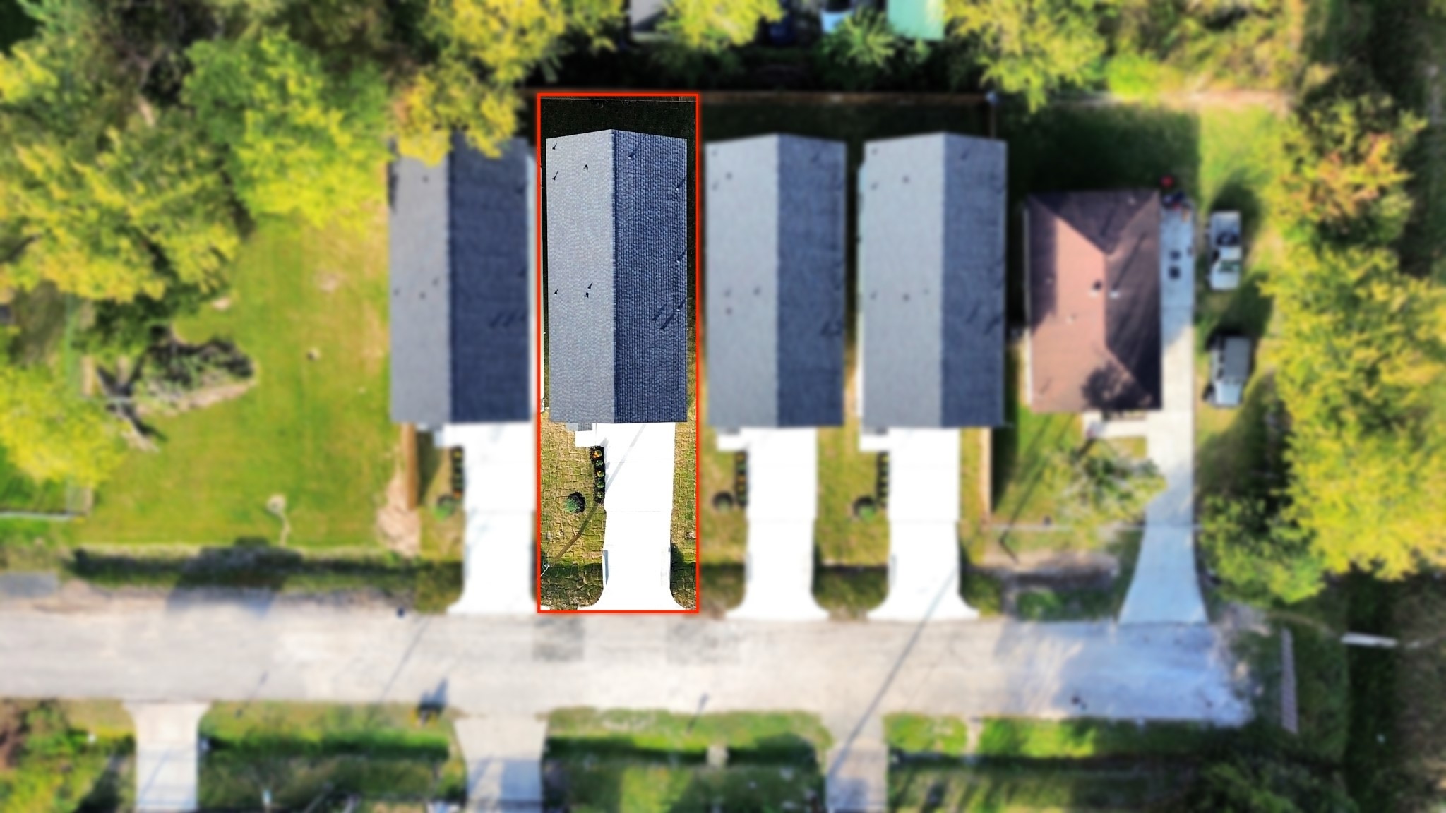 Overhead aerial view showcasing the four newly completed homes at 6671, 6673, 6675 & 6677 Nielan St, highlighting their matching architectural designs, individual driveways & property layouts.