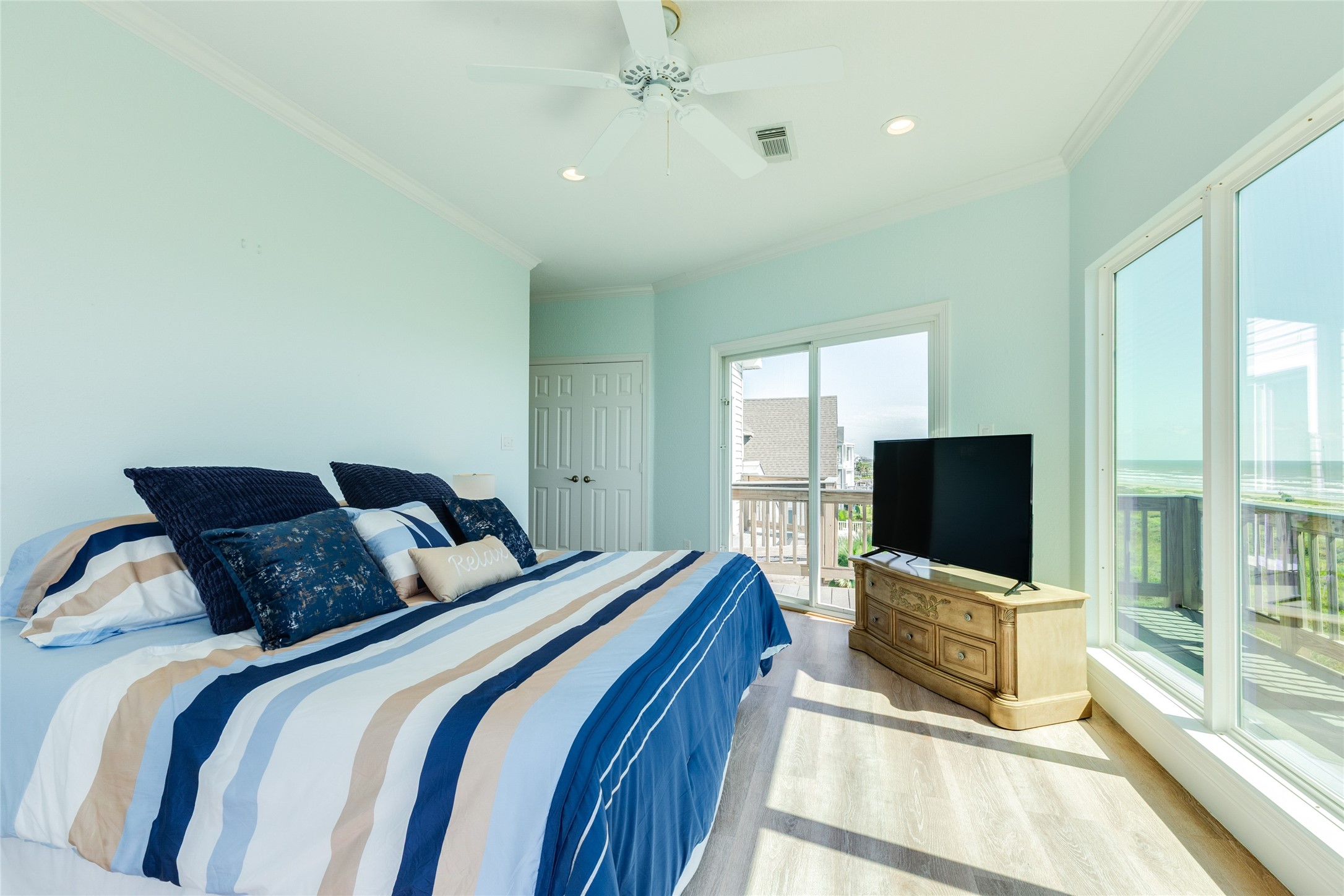 Large Primary Bedroom has a private deck