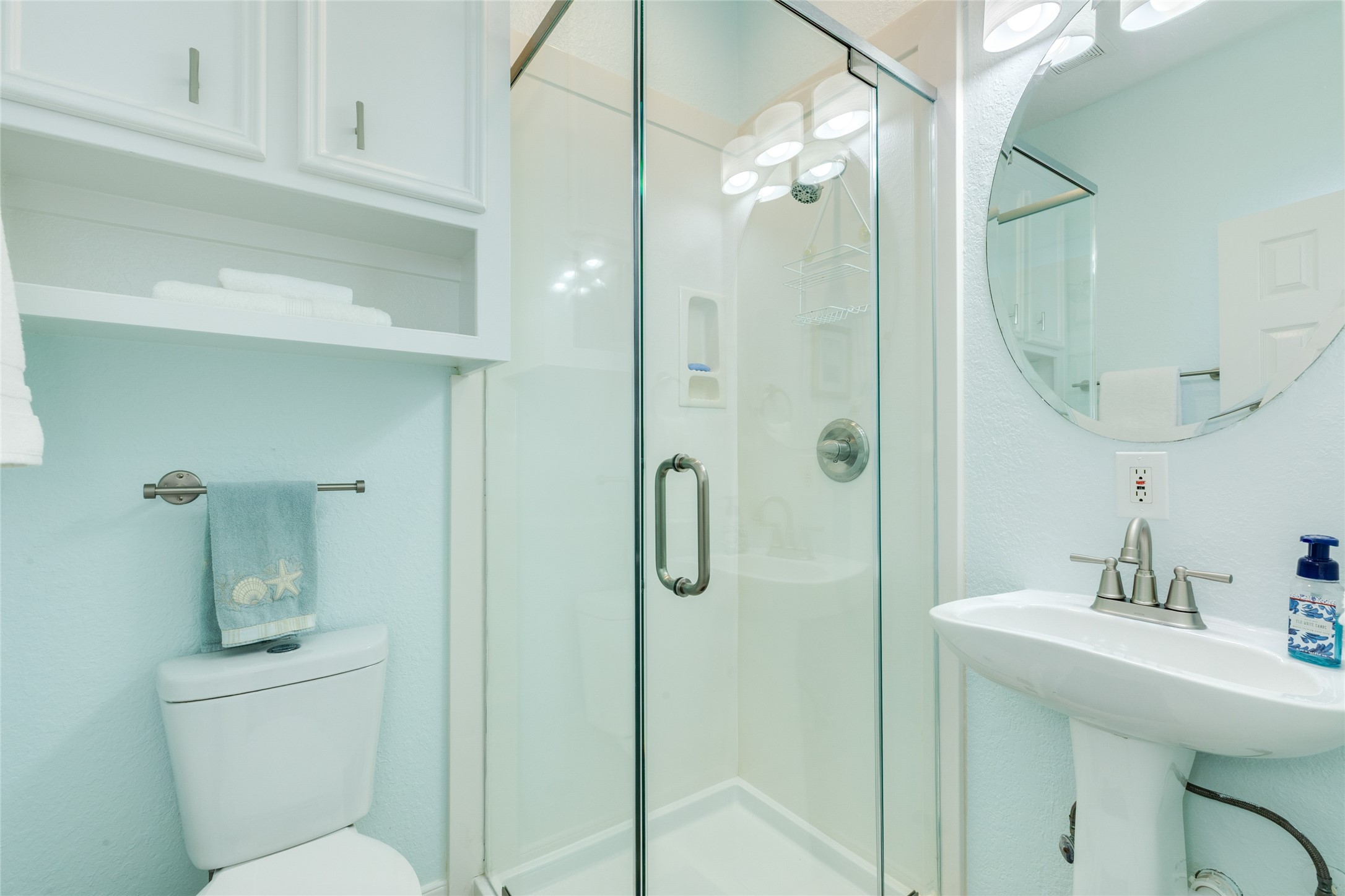 Remodeled Bath for the 4th Bedroom has a shower and pedestal sink