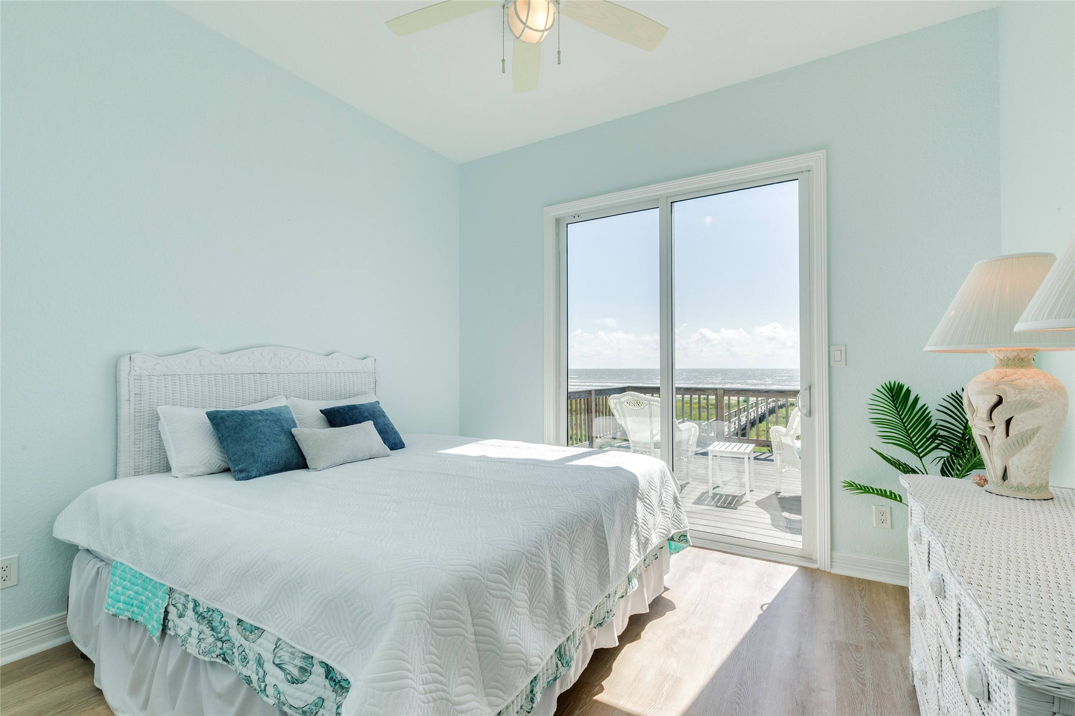 Bedroom 2 on the main level has deck access. Both of the bedrooms are off a private hallway
