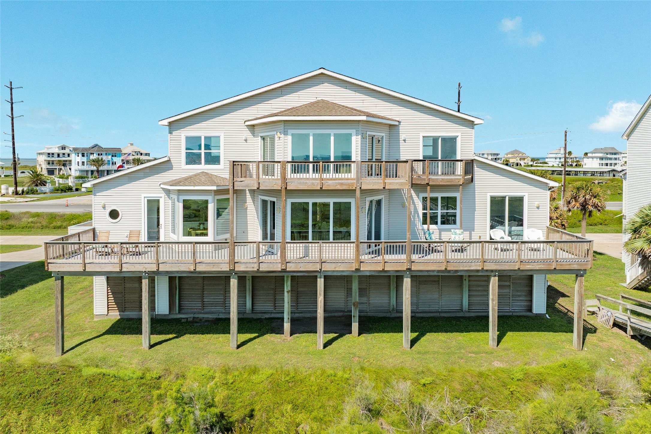 Expansive deck across the south side of the home has open and covered areas