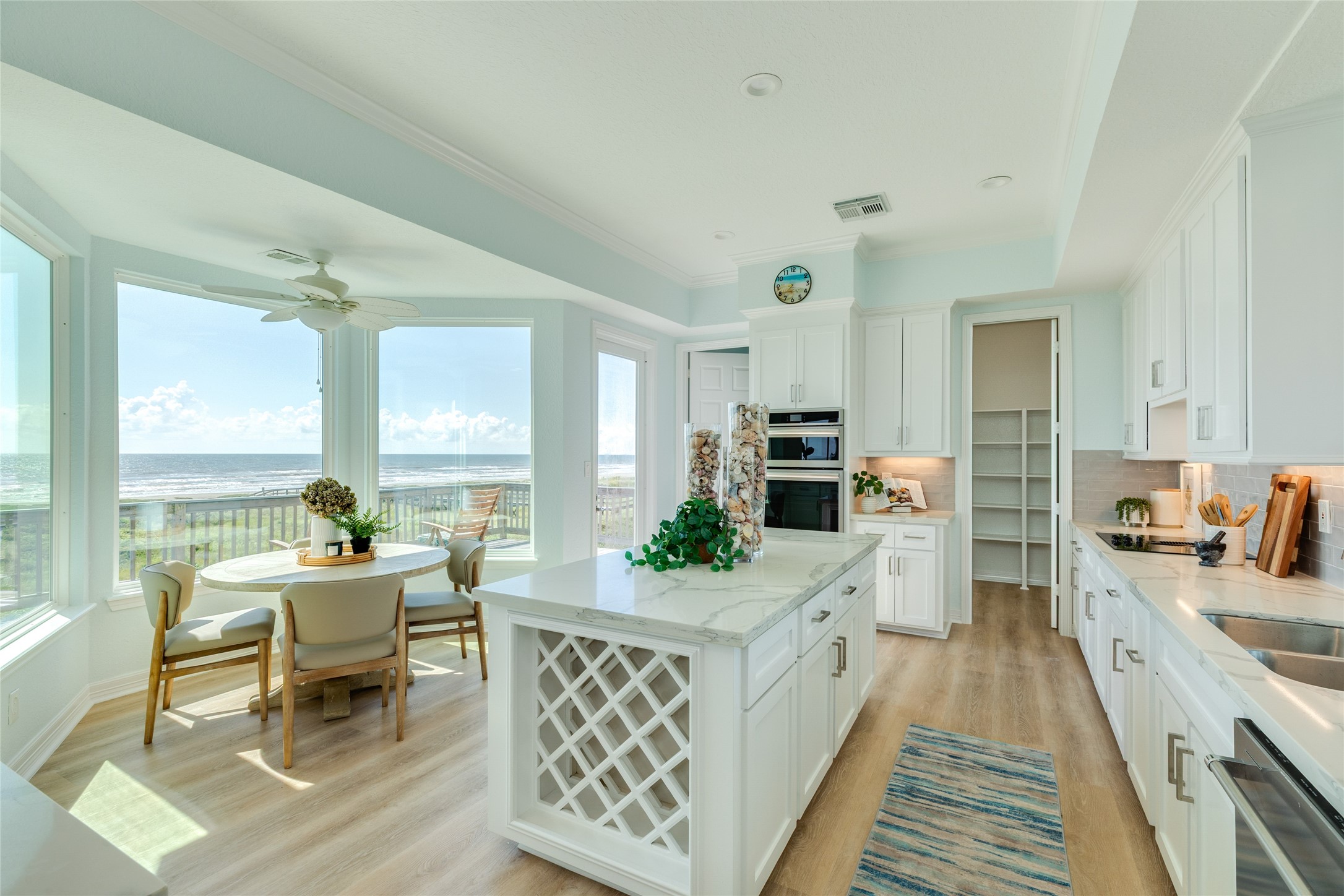 Spacious kitchen with a breakfast nook in front of the bay window