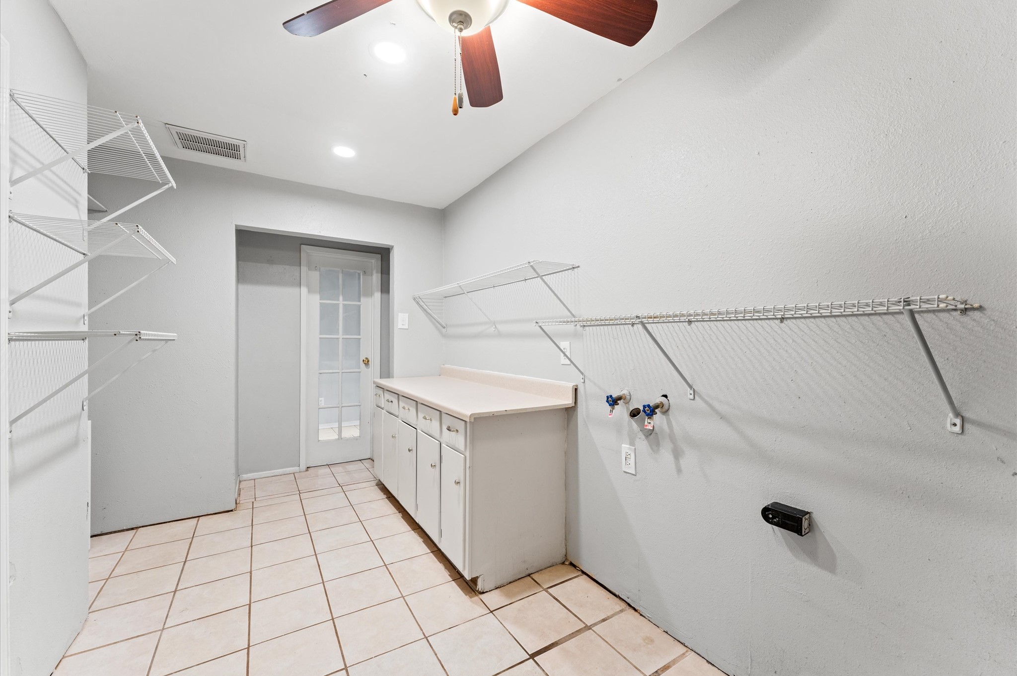 Lots of built-in shelving, counter space, and cabinets!