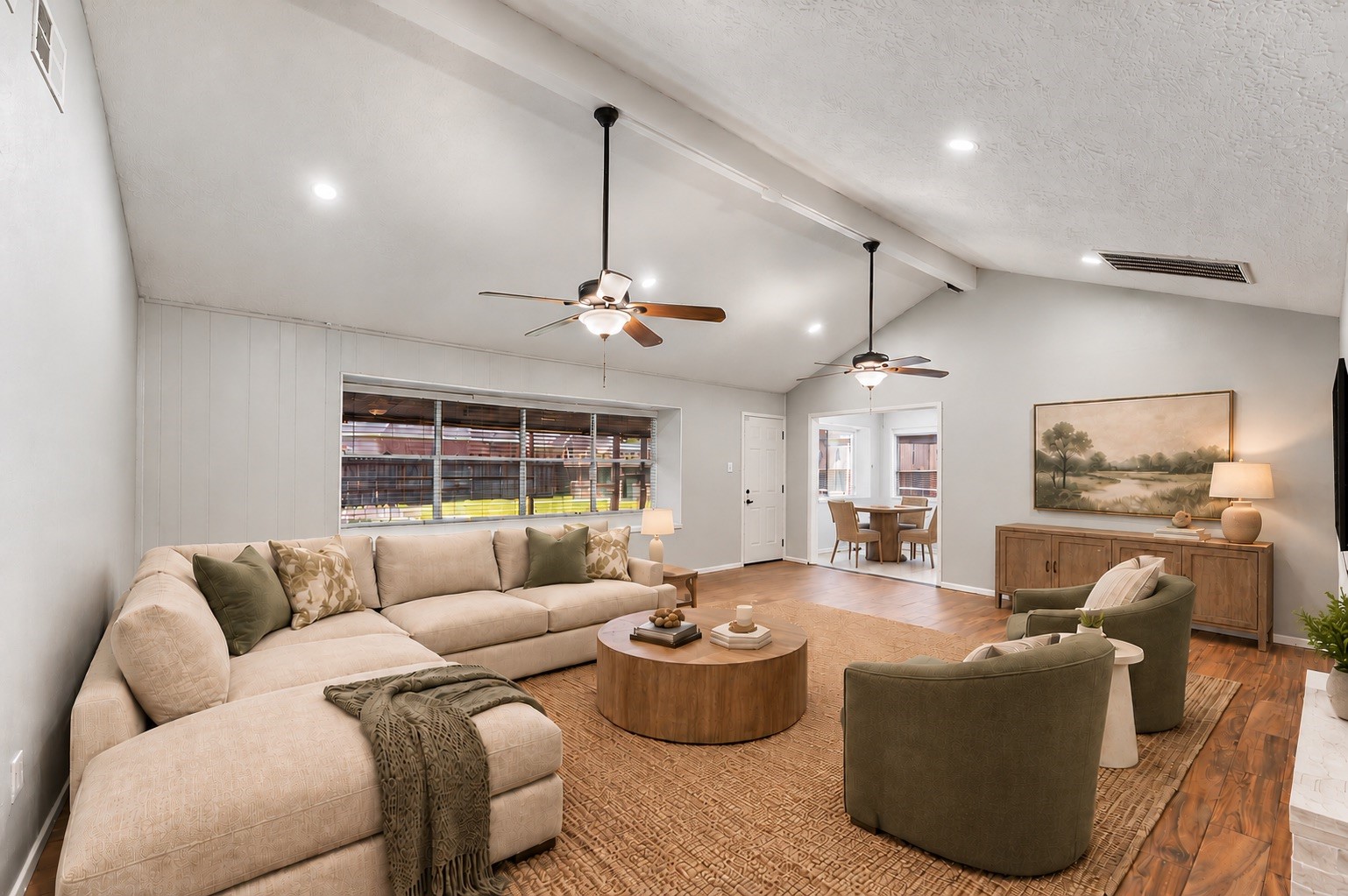 Living room opens to breakfast area. Room is virtually staged. Living room opens to breakfast area. Room is virtually staged.