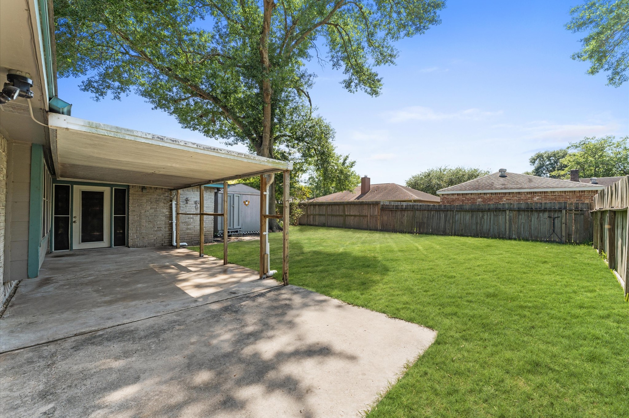 Enjoy a view of your backyard from the covered patio.