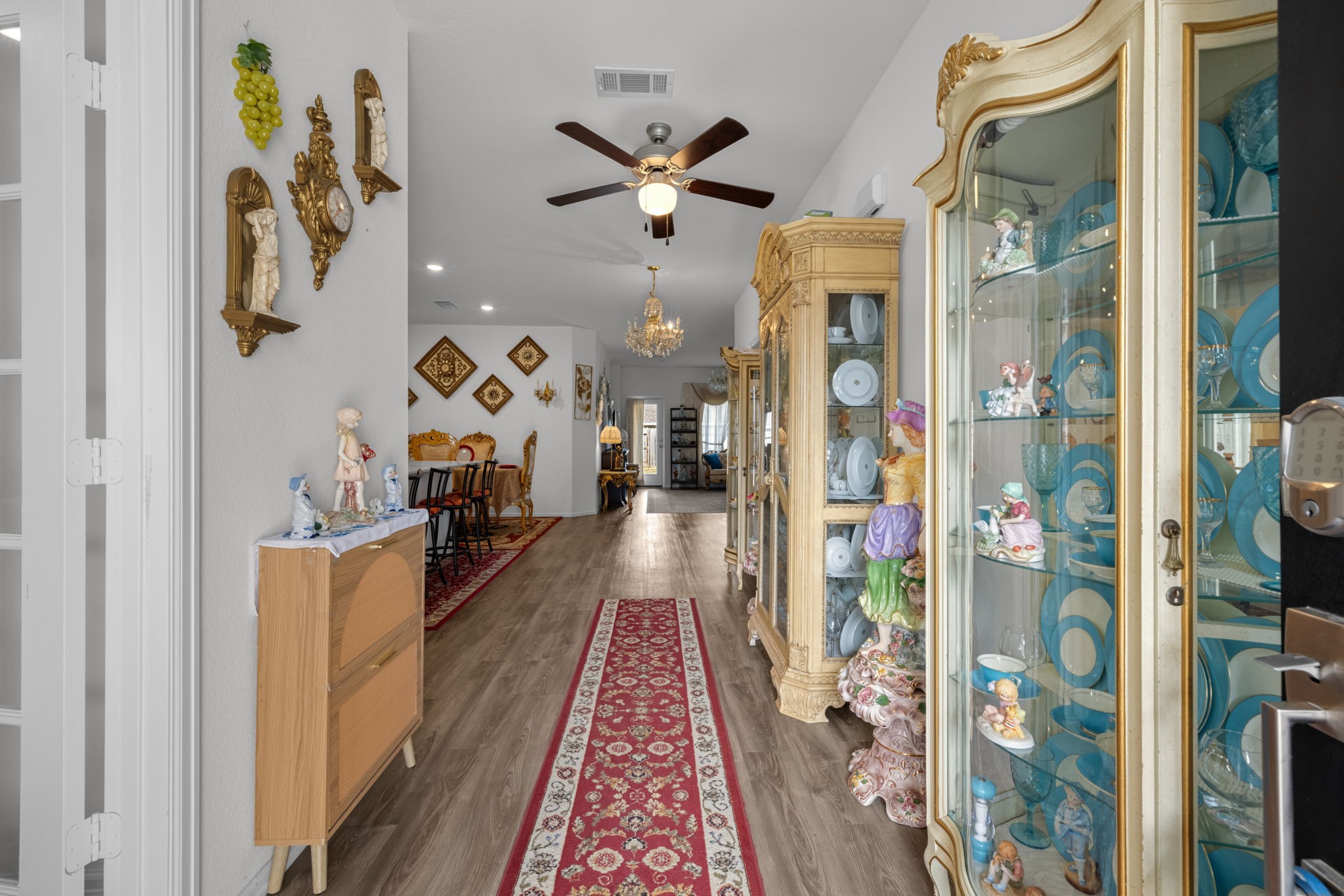 Current seller's furniture. Note the amount of space in this area. Enough to fit 3 china cabinets!