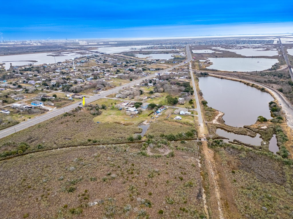 Regional aerial view with arrow identifying the property and illustrating its location along the Highway 6 corridor. Regional aerial view with arrow identifying the property and illustrating its location along the Highway 6 corridor.