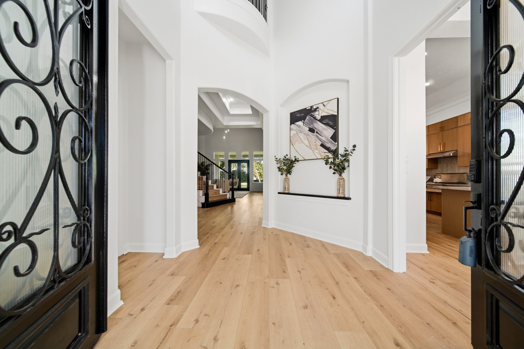 Grand ENTRY welcomes you with soaring ceilings, elegant architectural details, and an impressive first impression.
