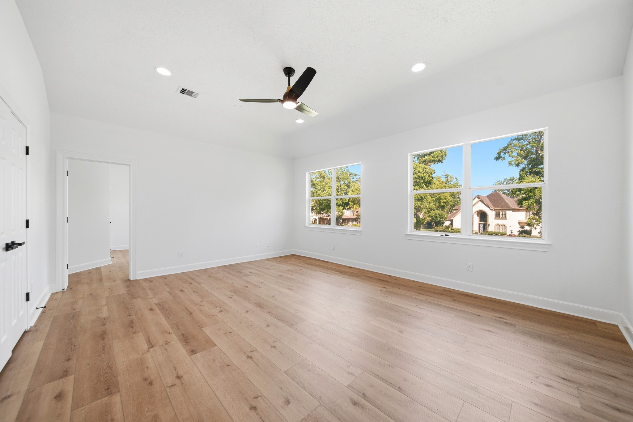 Spacious SECONDARY BEDROOMS offer generous layouts, large windows, and flexibility for family, guests, or a home gym.