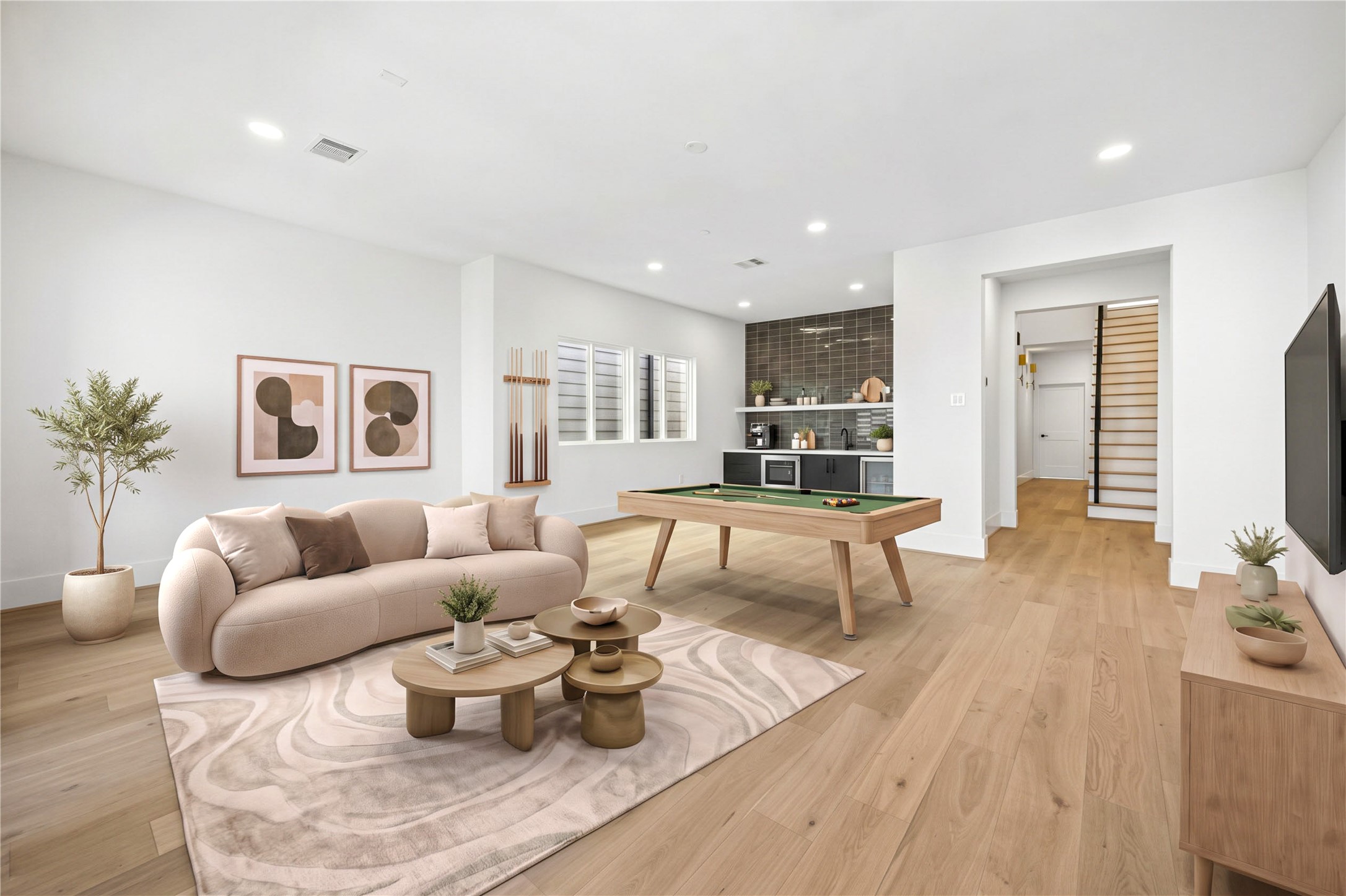 Game room - offers an entertainment bar. (virtual staging)