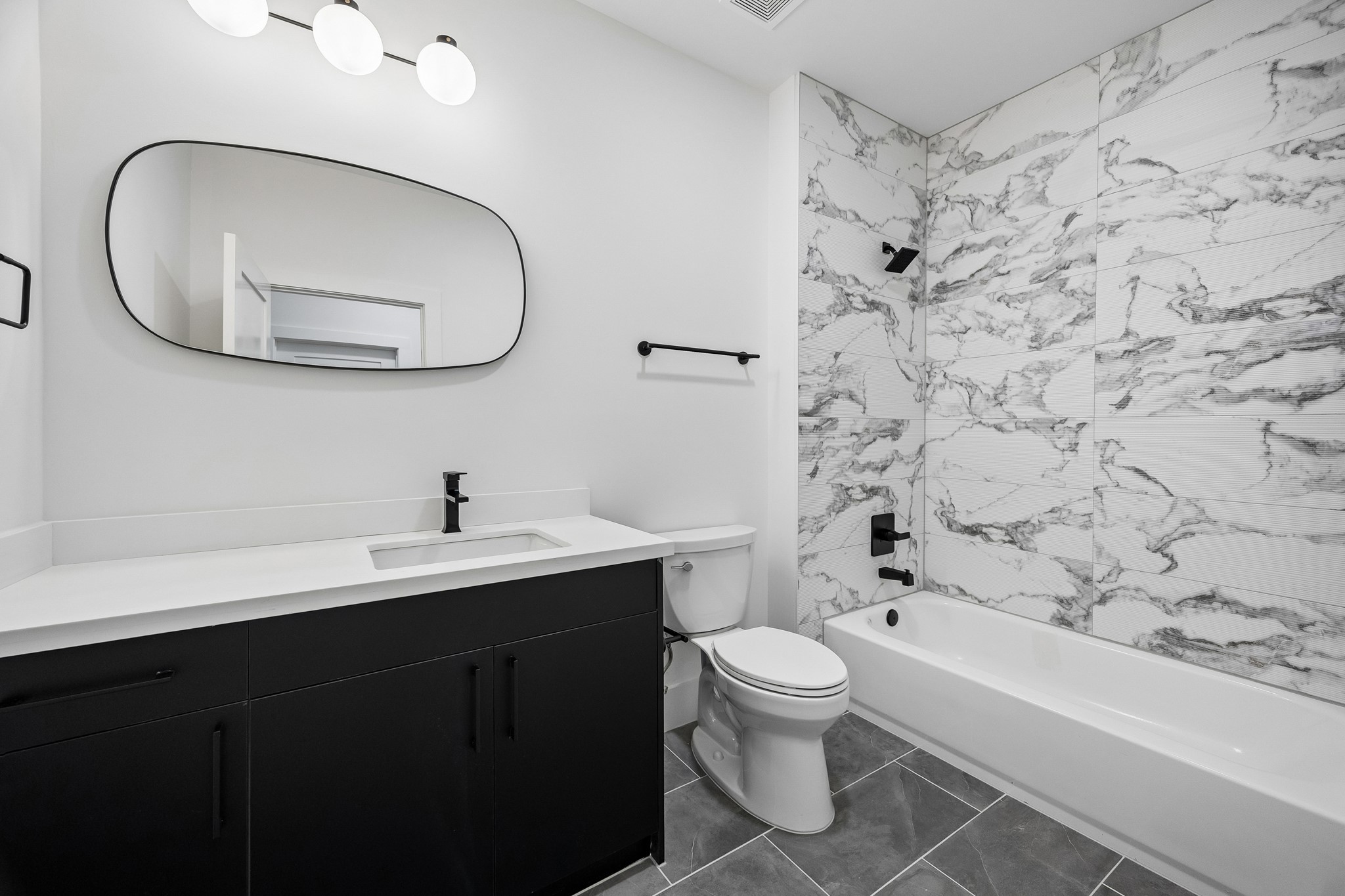Bath #4  features a shower/tub combo.