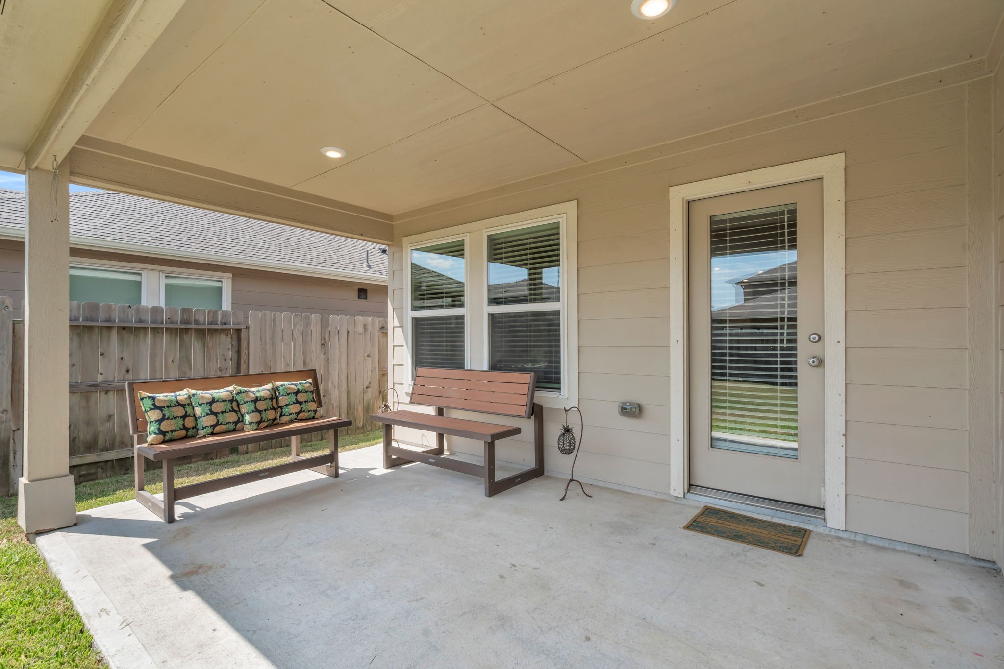Step outside to the backyard with a covered patio.
