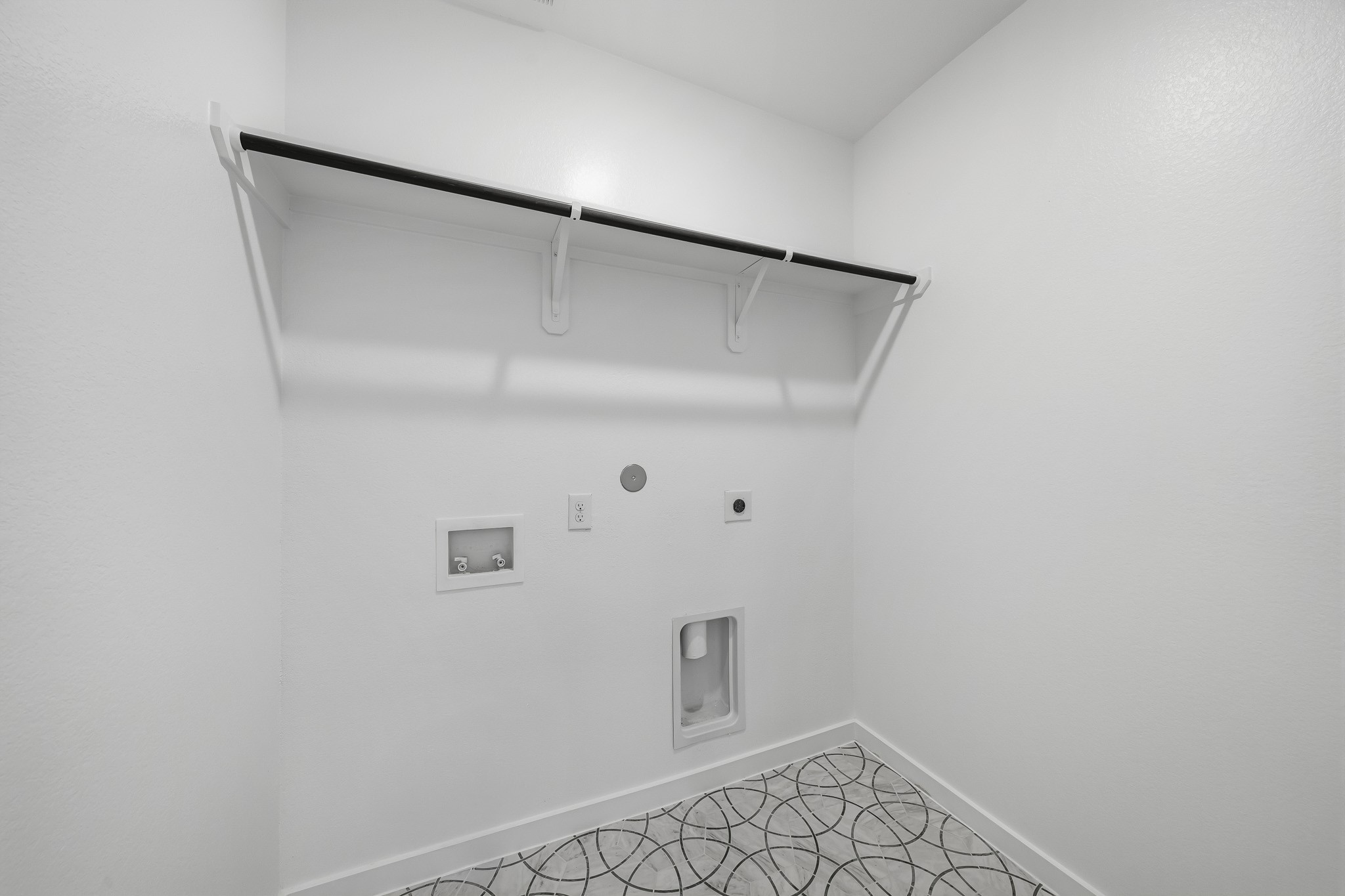 Spacious Utility Room With Trendy Tile