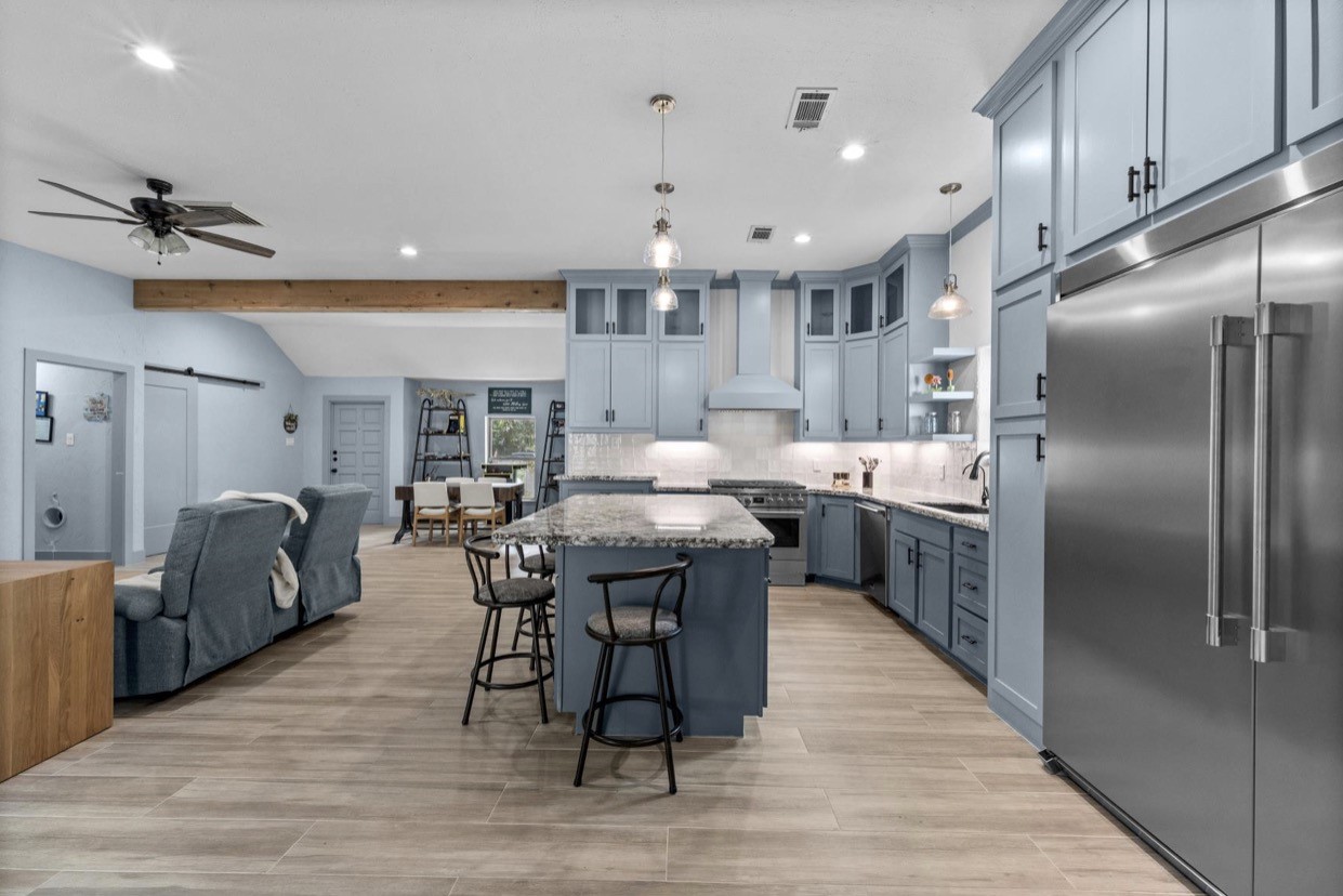 View from the kitchen toward the open living and dining areas.