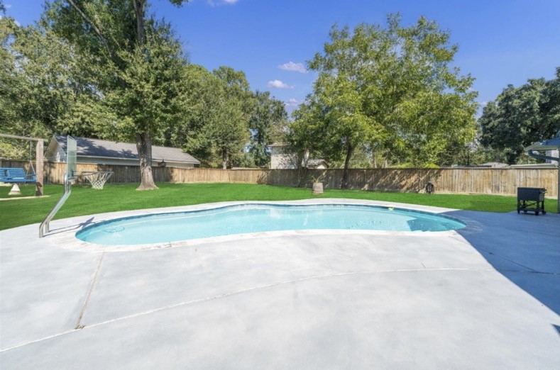 Enjoy a private backyard pool with maintenance provided by the landlord.