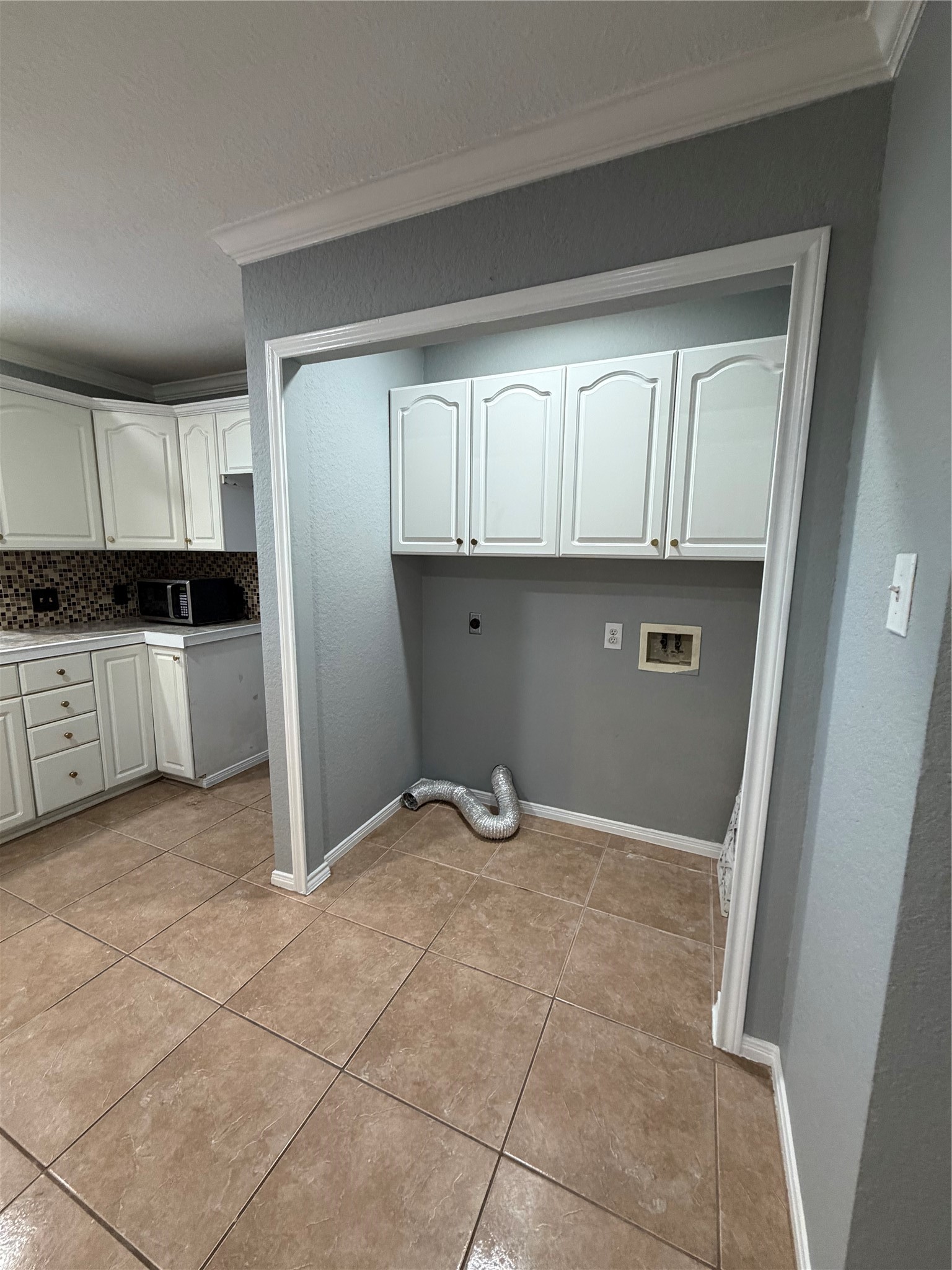 Washer and dryer connections.