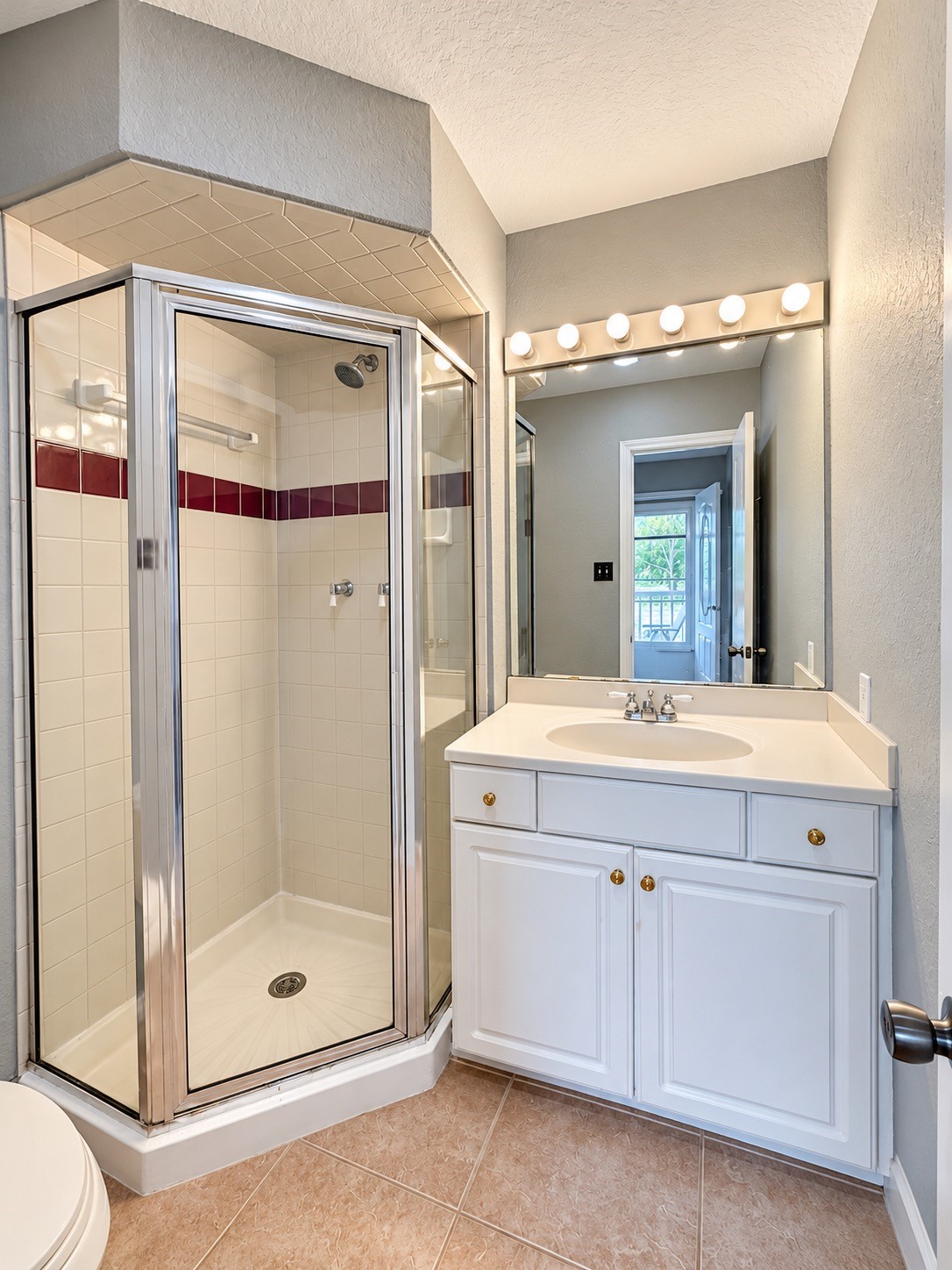 Secondary bath upstairs.