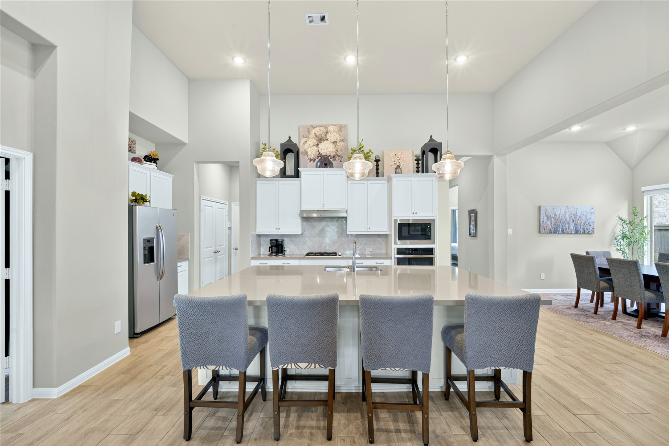 The kitchen is truly the center of the home, conveniently situated next to the home office and dining room. All SS appliances included.