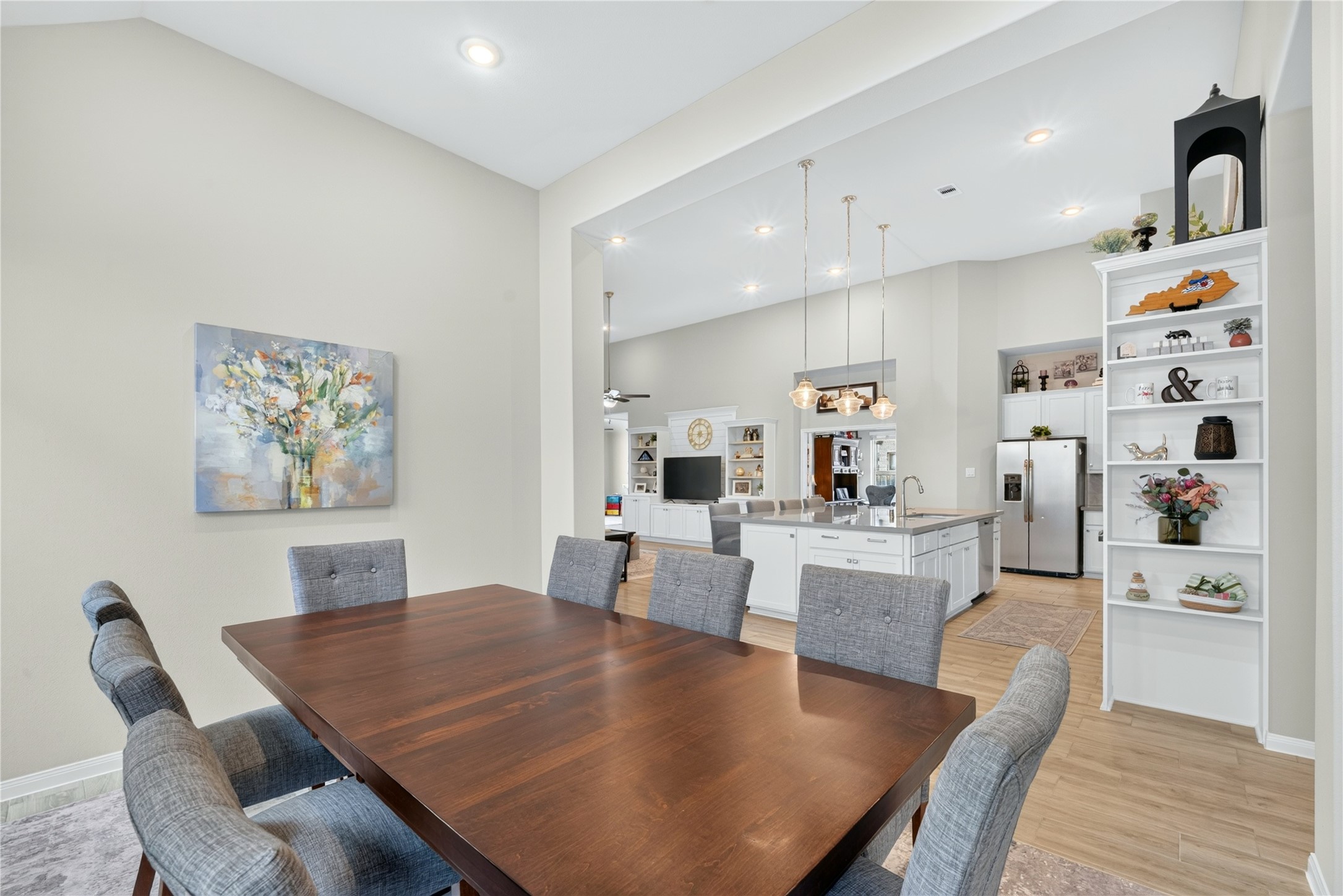 The Anson Floor Plan by Coventry Homes is thoughtfully designed for effortless flow and connection. The dining room opens seamlessly toward the kitchen, creating a welcoming space for entertaining.