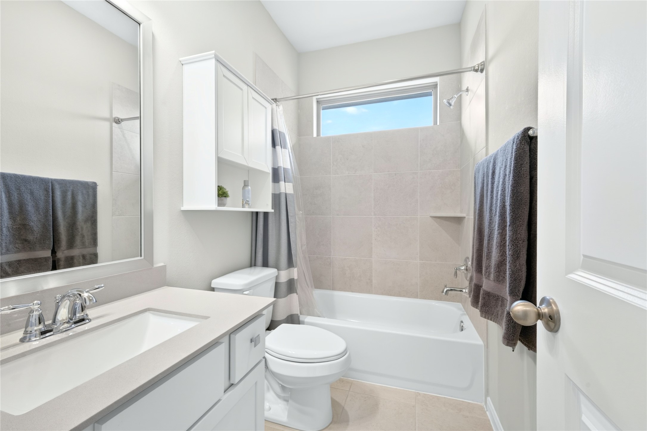 Conveniently located next to one of the secondary bedroom and spacious game room, this beautiful full bathroom offers easy access for family and guests.