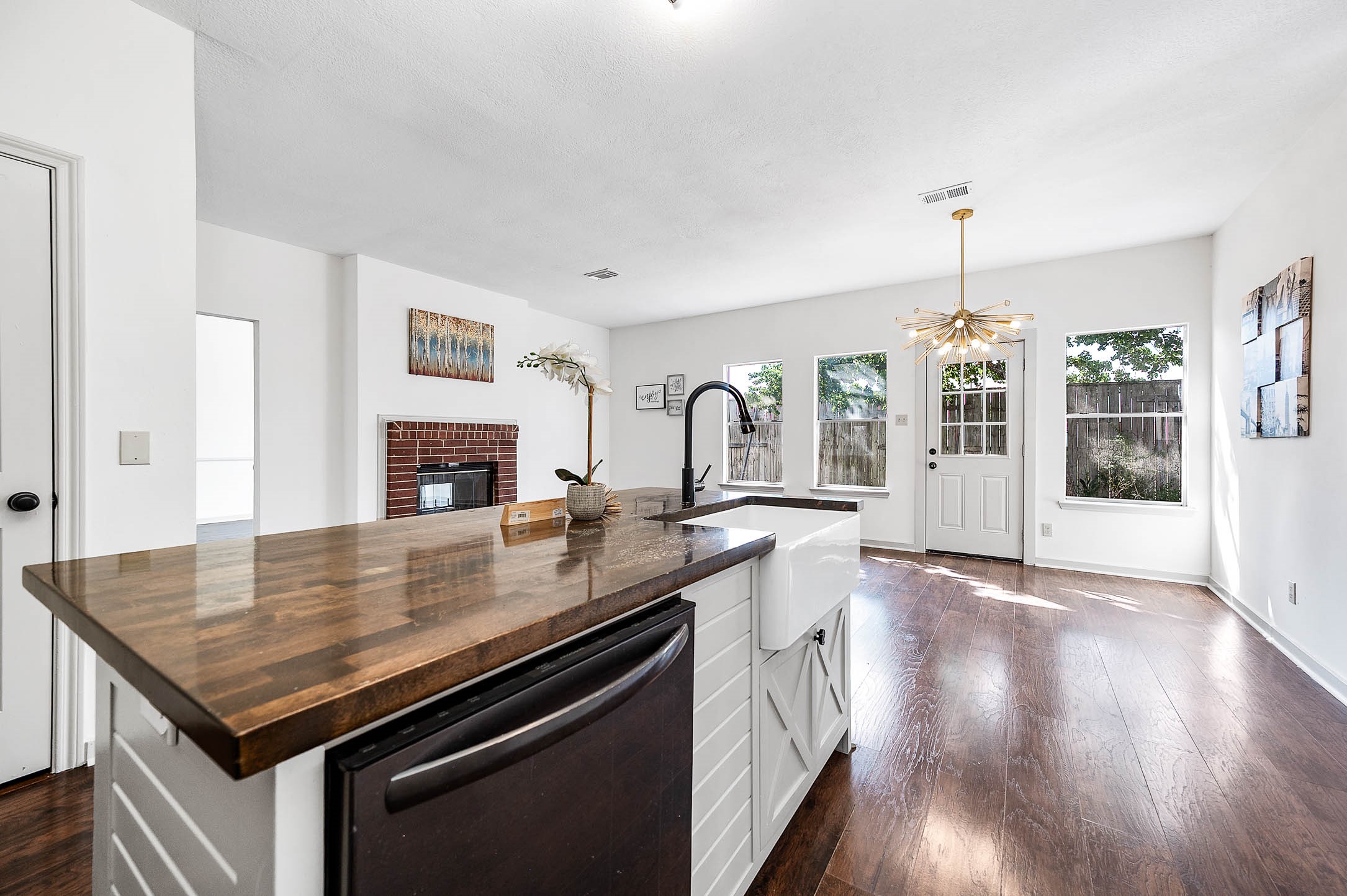 Beautiful butcher block island & also durable to added character to the kitchen
